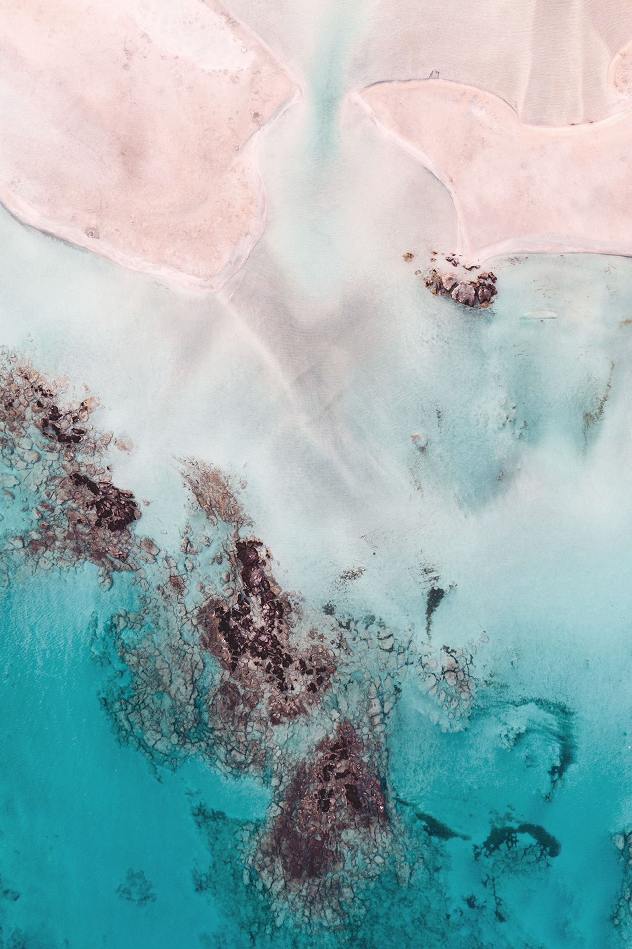 Balos is surrounded by all that white sand and shimmering flecks of pink from crushed shell
