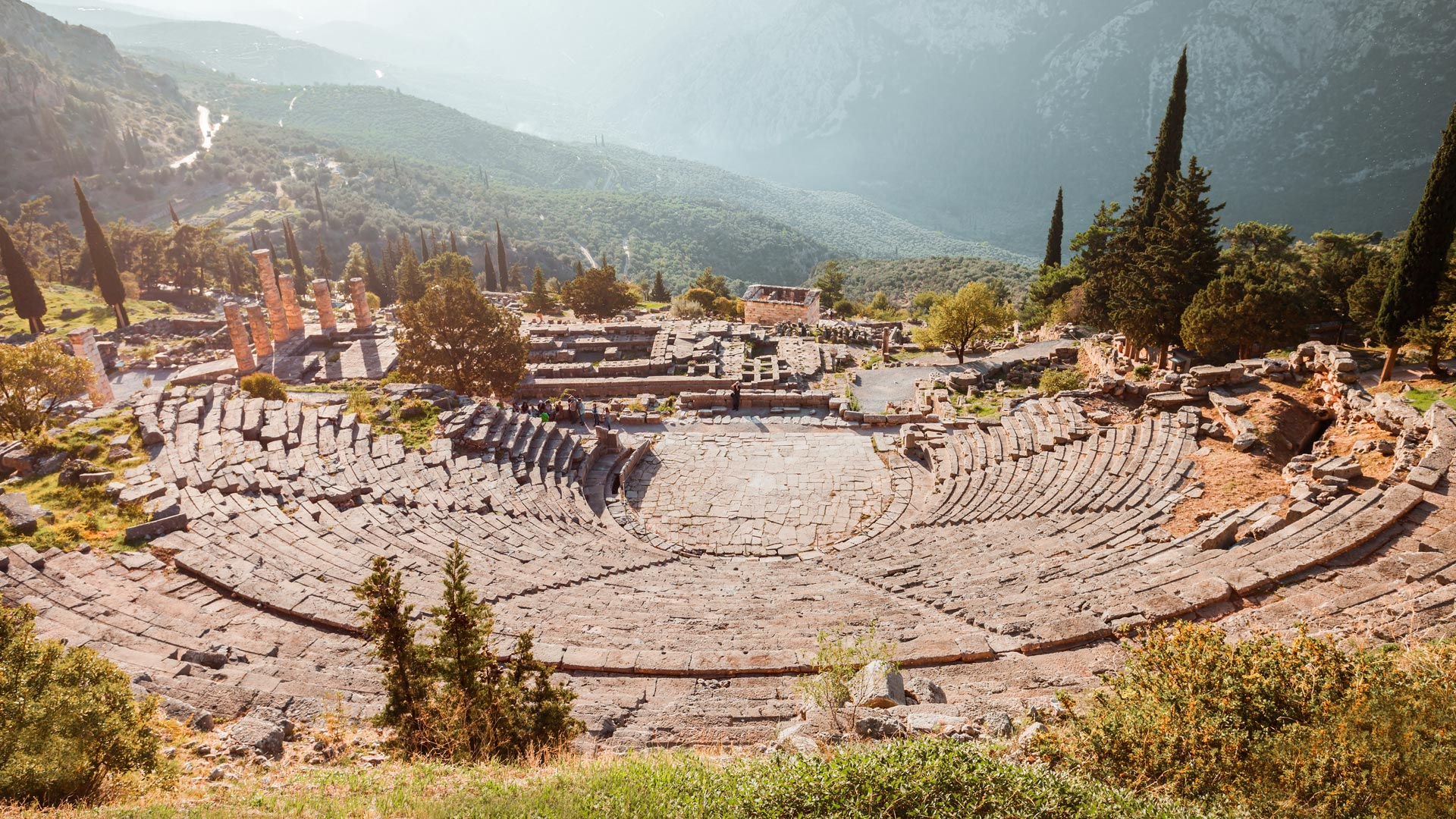 Located above the Temple of Apollo, the Ancient Theatre looks over the entire sanctuary and a valley of olive trees