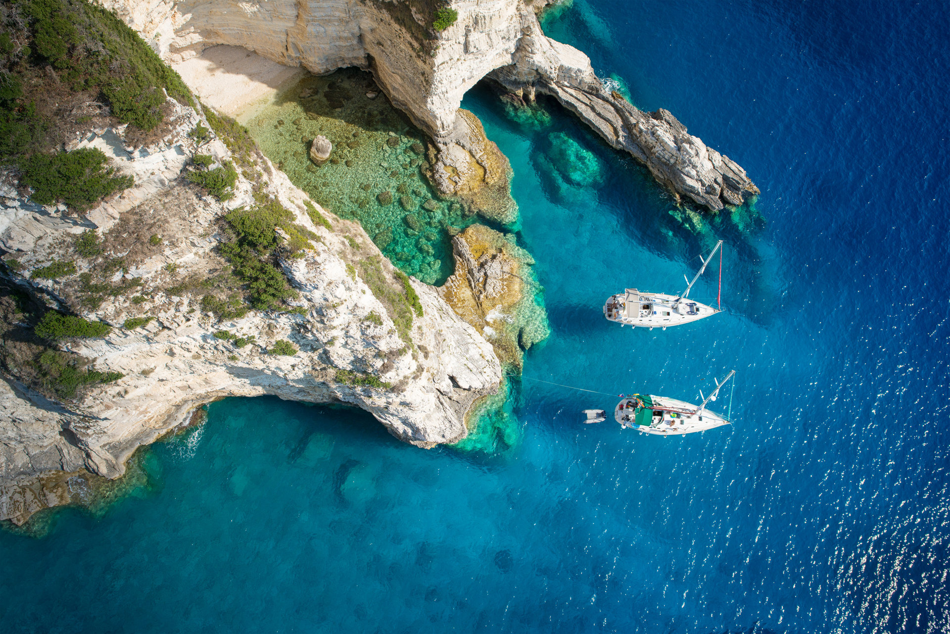 Sailboats in Paxos island