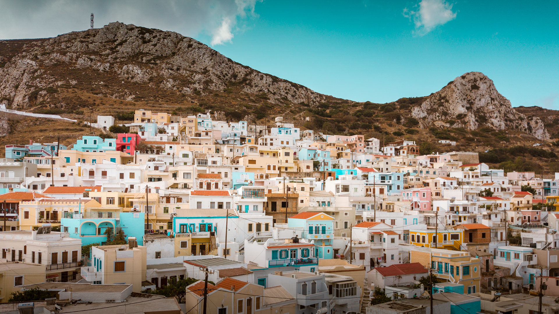 Take a stroll - you’ll especially enjoy the yellow and blue shutters of Menetes