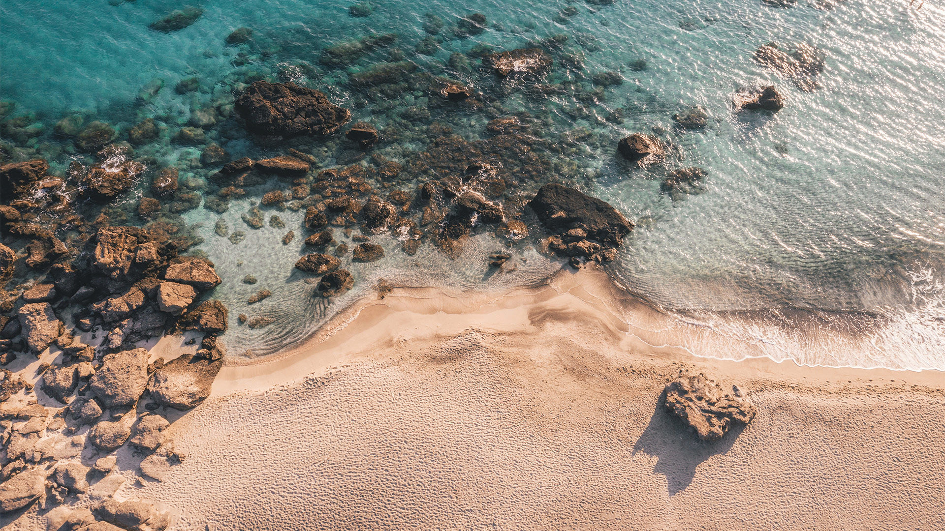 The sand extends for some distance along the mainland coastline and Elafonisi itself is about a mile long
