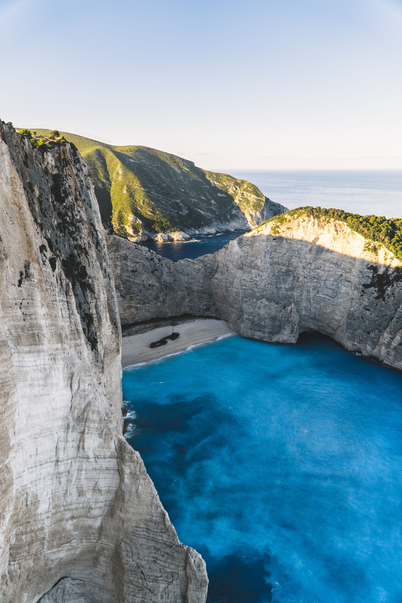 The water in Navagio often radiates impossible shades of blue