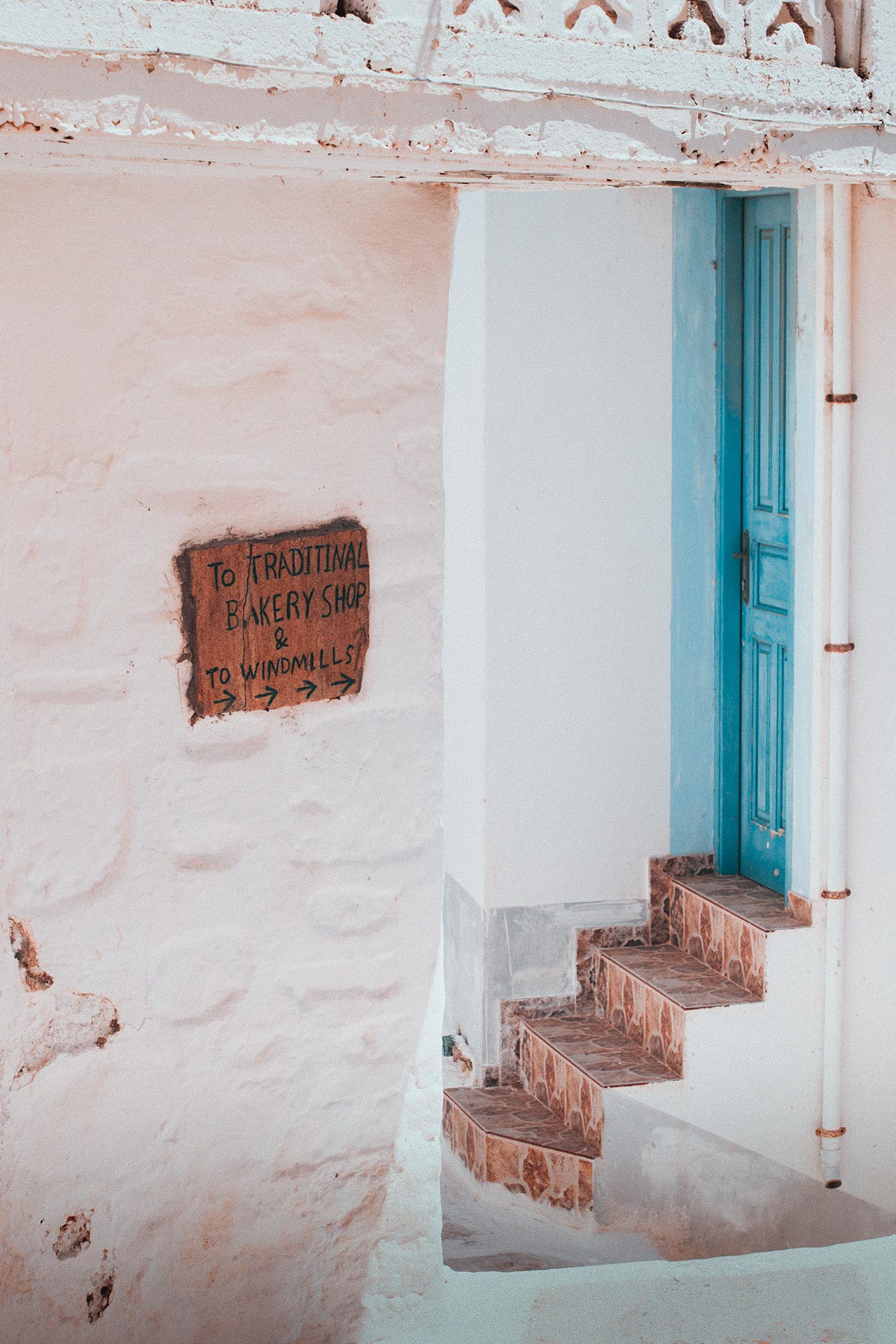White and pastel-washed buildings of Olympos