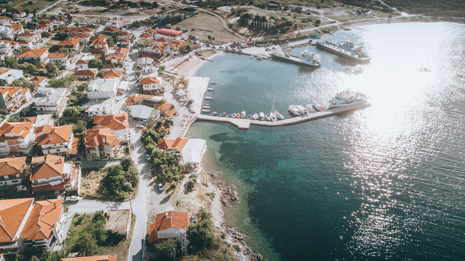You’ll enjoy walking around the port and the old shipyard, known as Arsanas