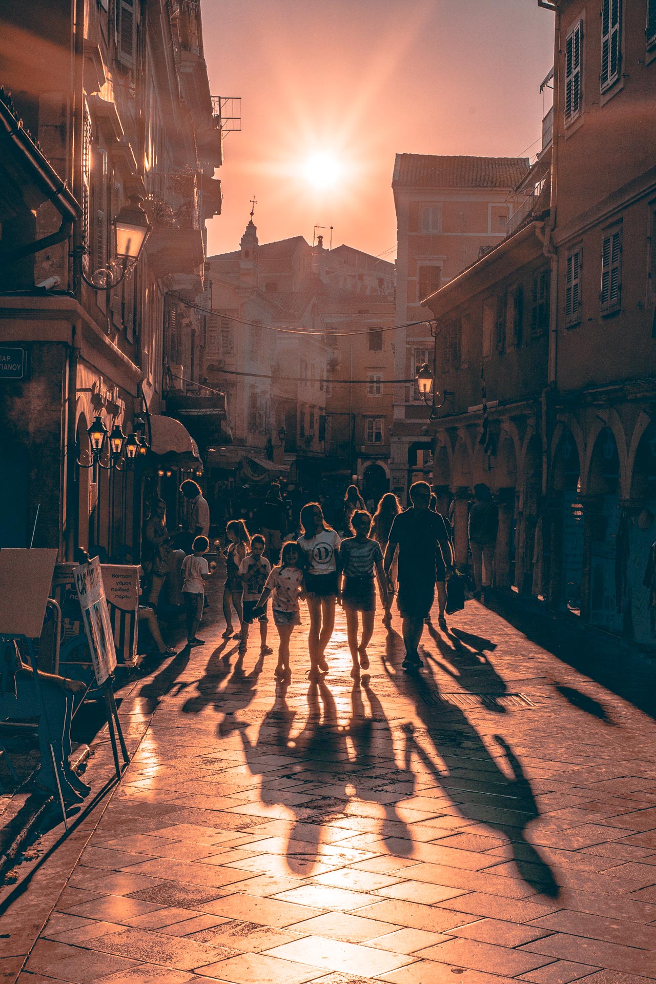 Corfu is a city with old tall buildings, separated by slopes and narrow streets which are called Kantounia