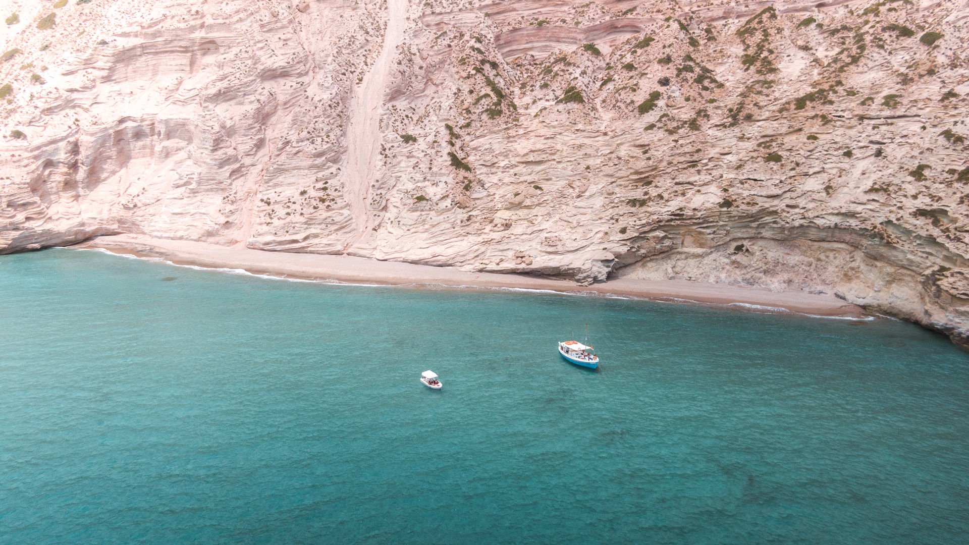Gerakas, you’ll find white sand, clear blue water and the distinctive backdrop of a rockface sloping upwards from the beach