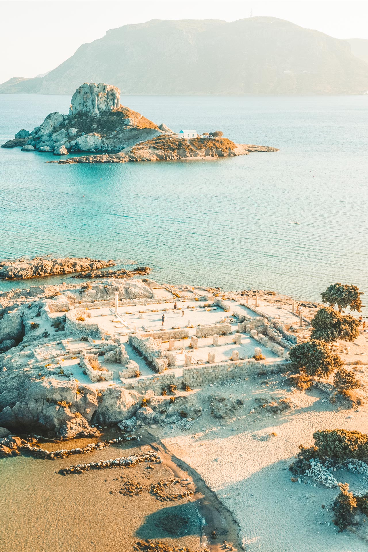 It’s not just the natural beauty of Agios Stefanos beach, but the tiny rock of an island opposite, called Kastri