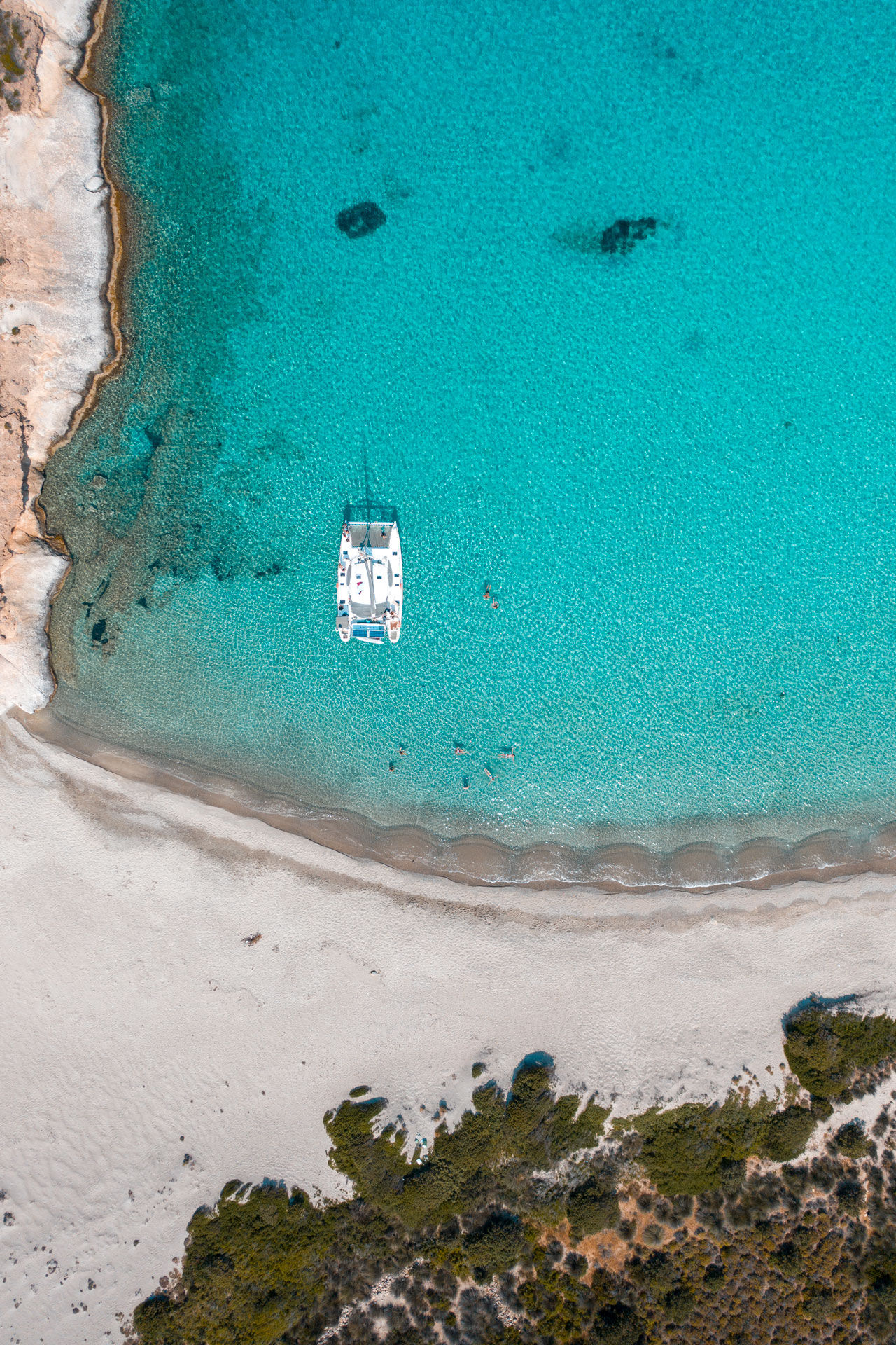 Polyegos' beautiful blue-green sea and remote bays