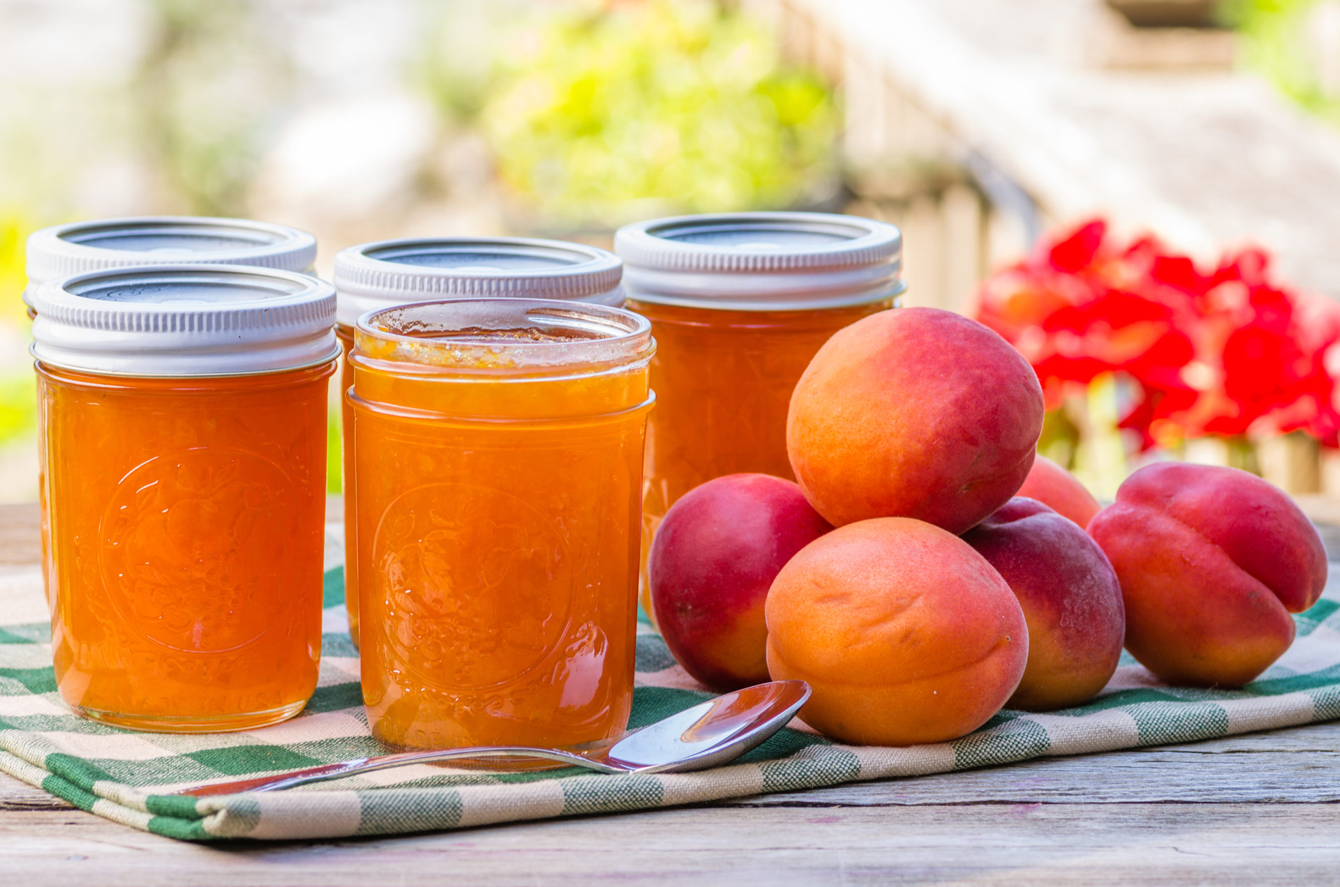 Jars of homemade apricot jam or preserves