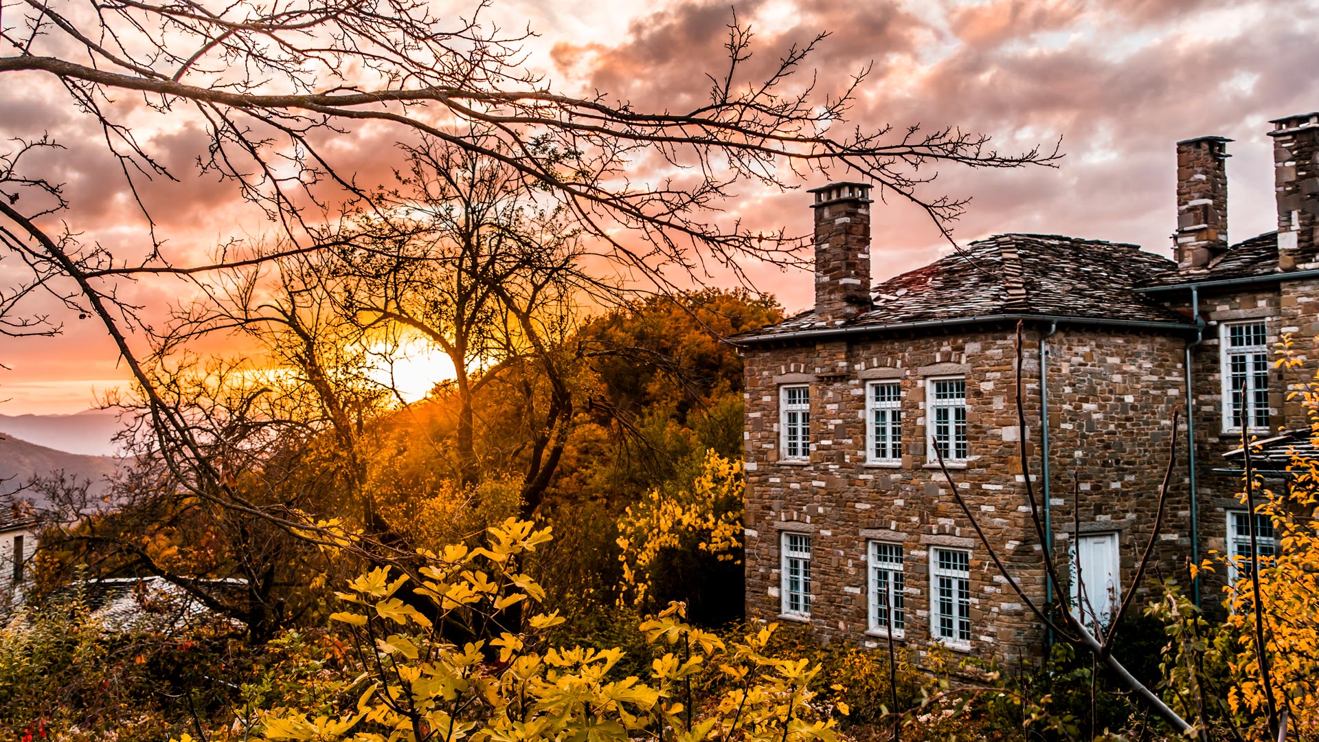 Sunset on a traditional alley in Megalo Papingo village in Ioannina