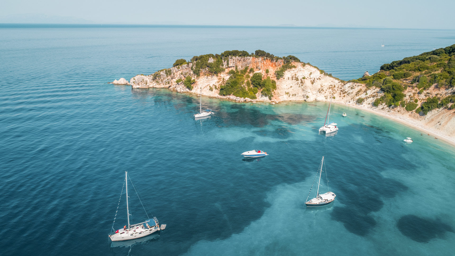 Take a boat trip from neighbouring Kefalonia, just a couple of miles away and to spend the day going from gem to gem
