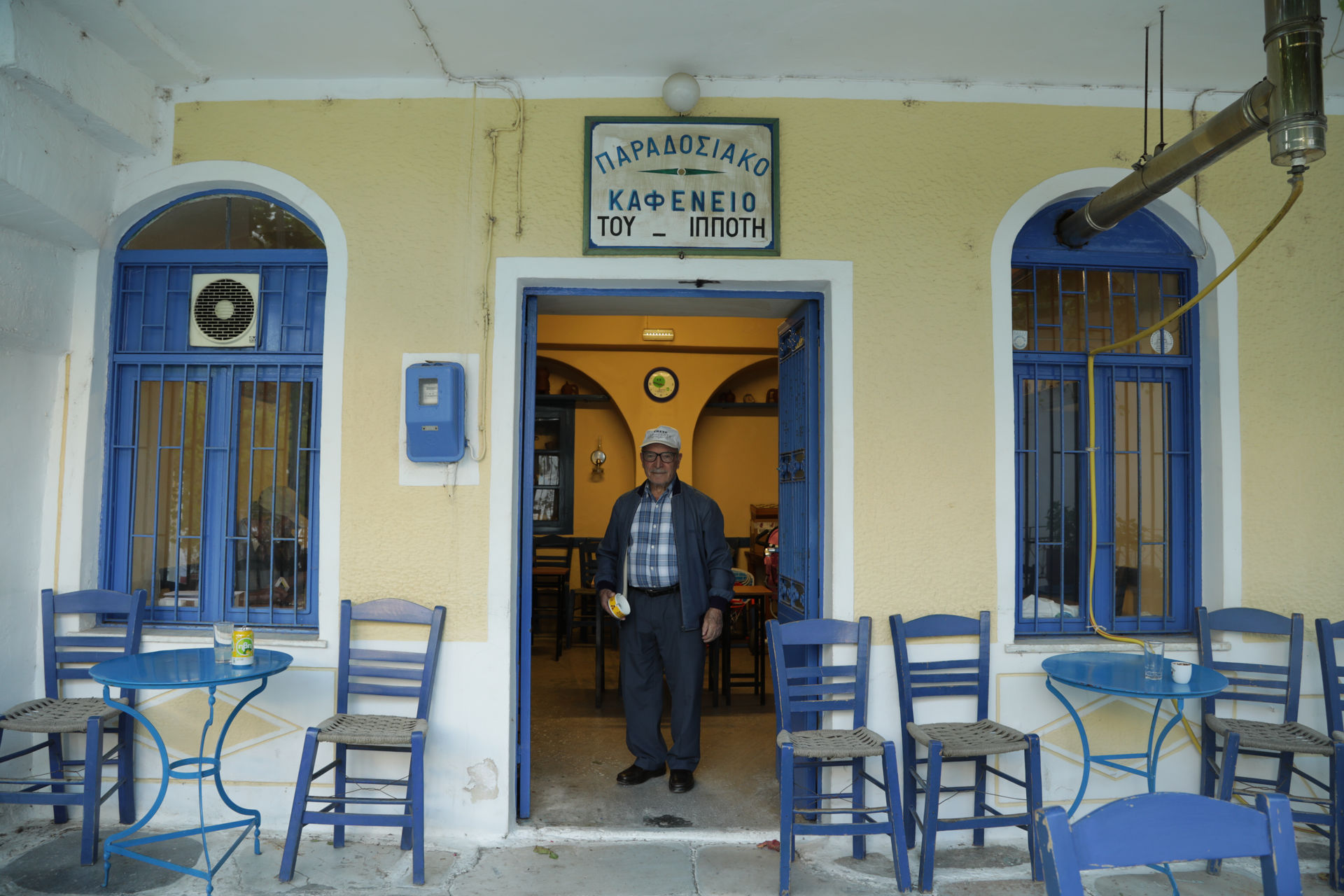 Traditional coffee shop where village elders spend long, lazy afternoons-Koronos village