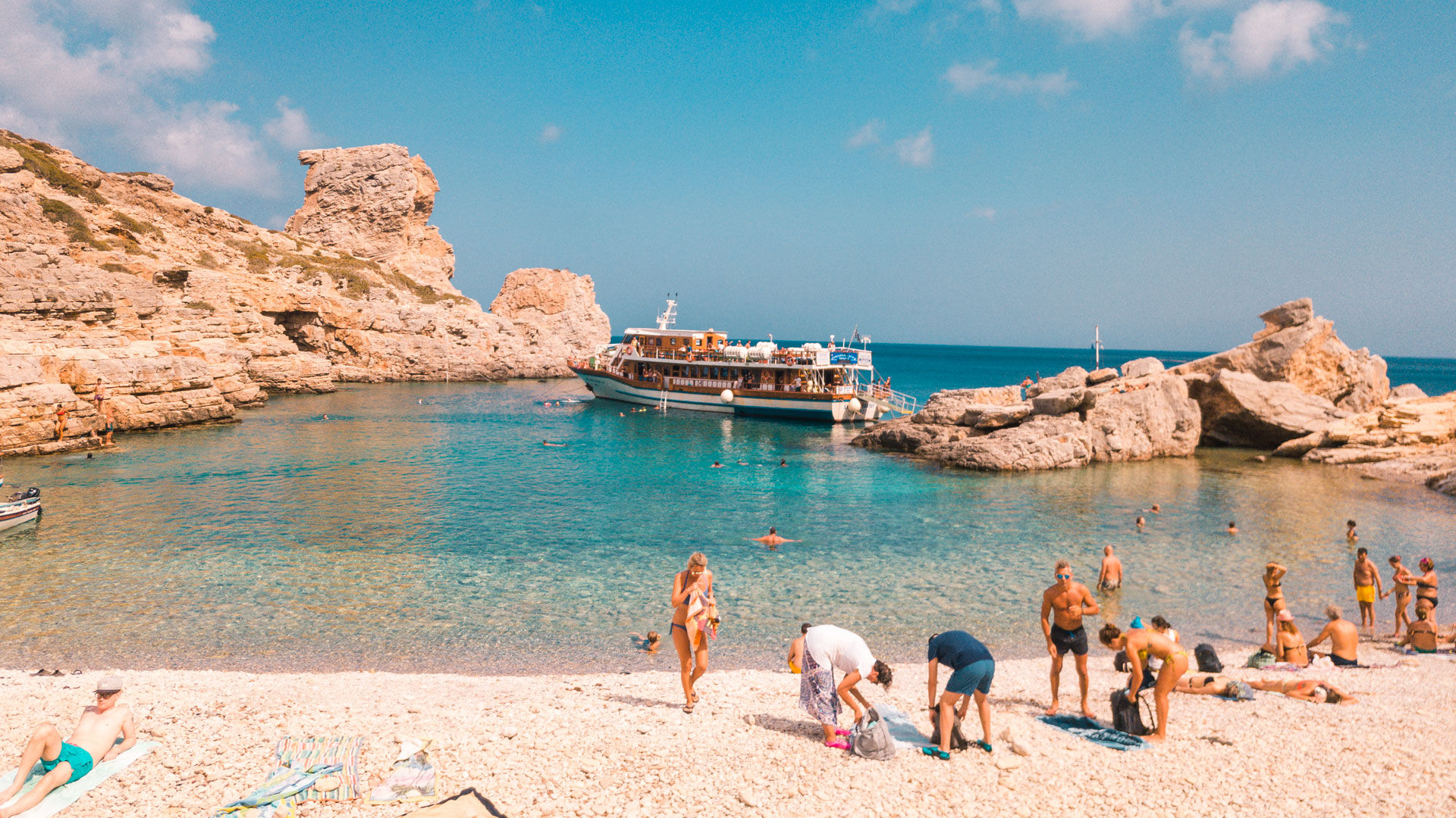 With blue-green water, tamarisk trees and a gorge in the background, it’s impossible not to immediately unwind when you arrive at Palatia Beach