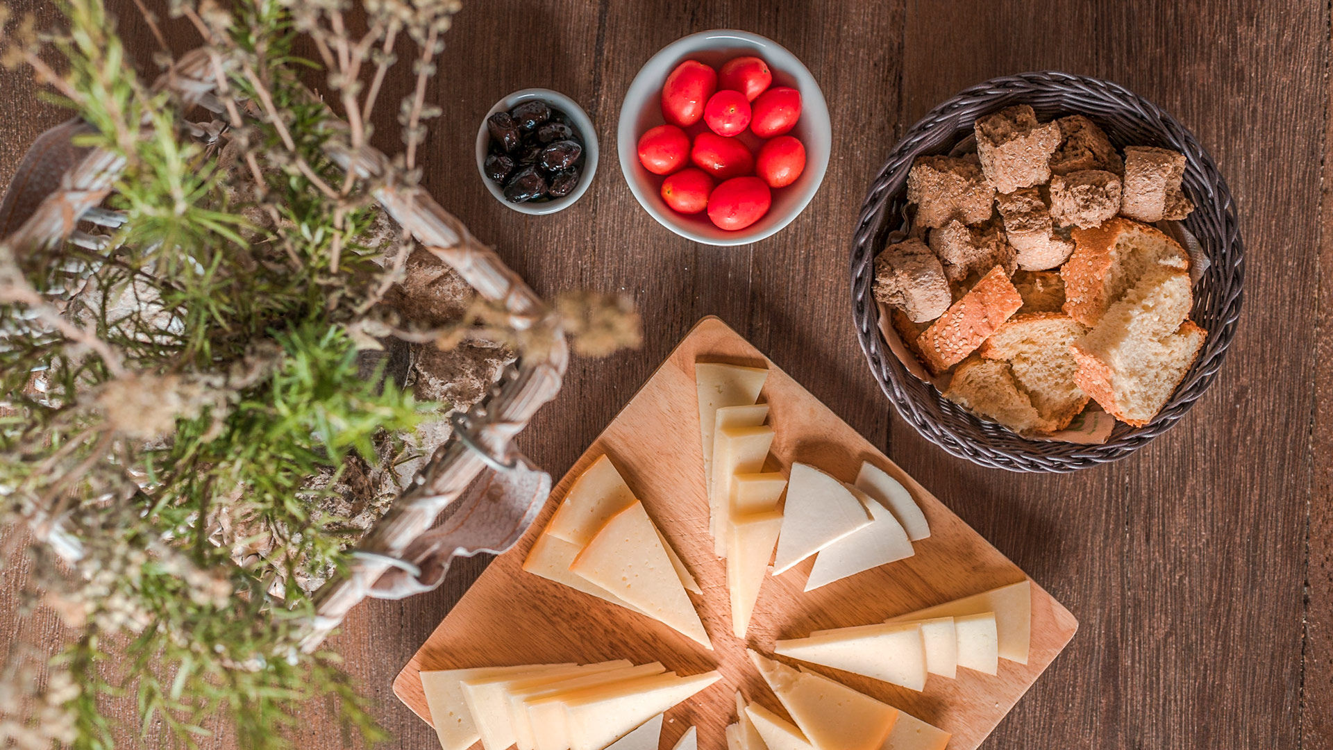 A variety of local cheese, cherry tomato and Cretan paximadi to accompany your wine!
