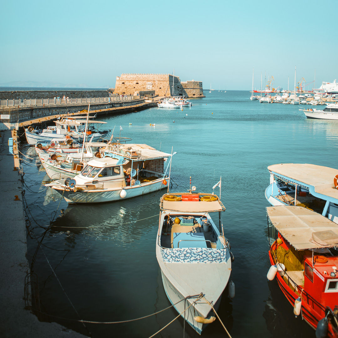 Fishing boats at Heraklion harbour and Koules Fortress