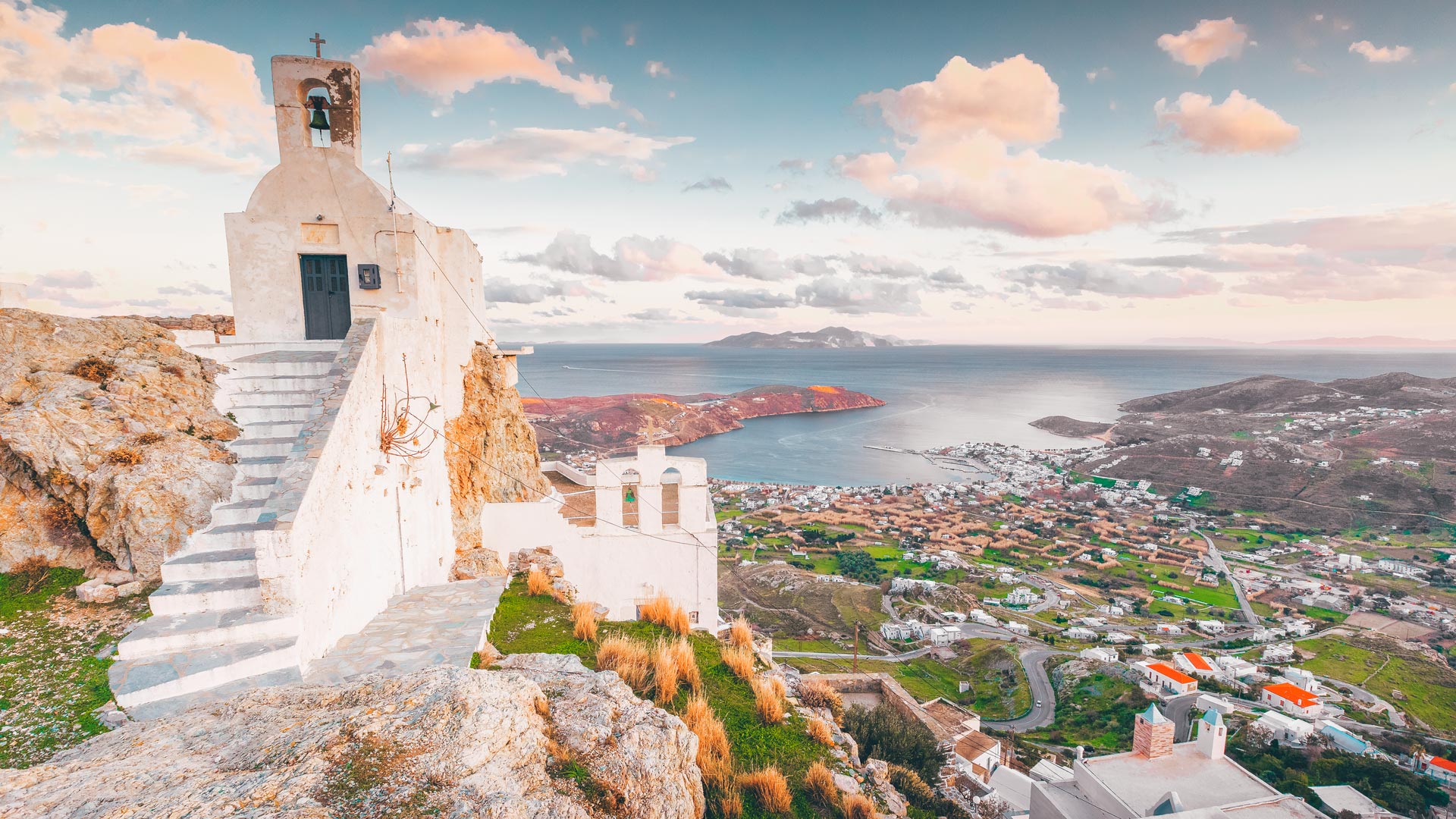 From the beautiful chapel of Agios Konstantinos nearby, you can look out beyond Livadi onto a who’s who of Cycladic islands