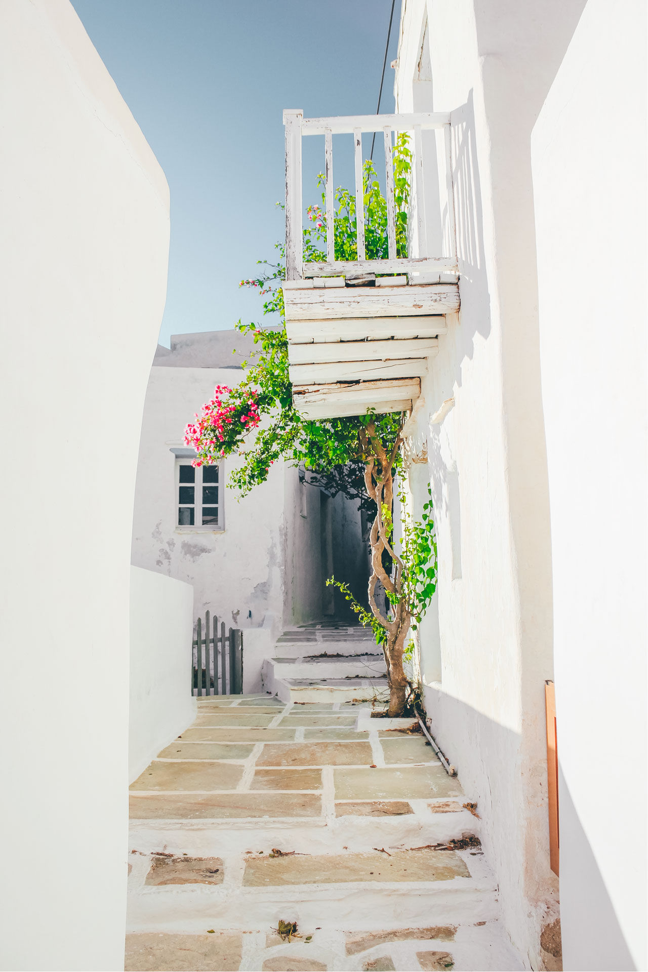 It’s a Cycladic maze of whitewashed alleys and small courtyards and cascading bougainvillea
