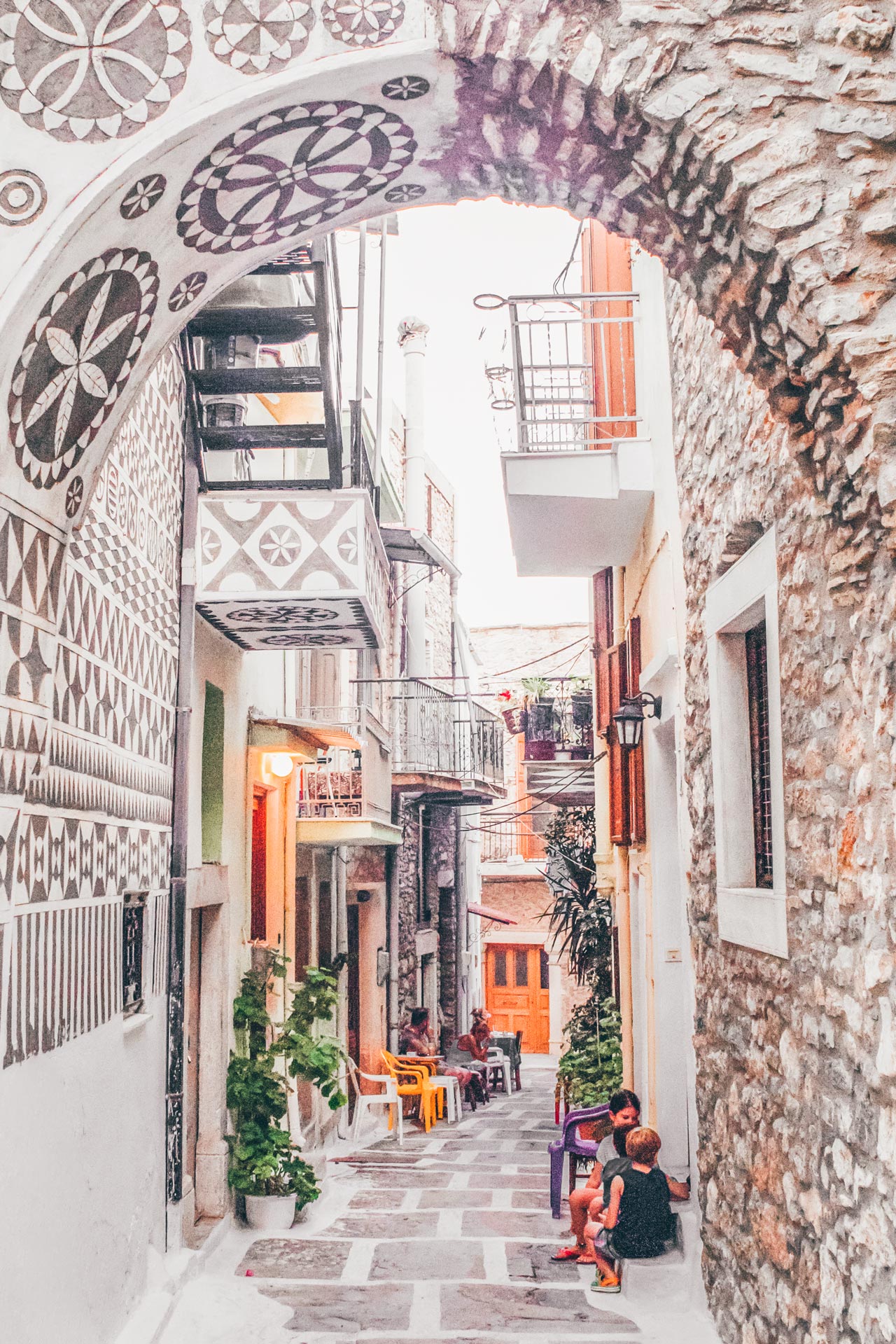 Take your time to amble down the narrow cobblestoned alleyways, admiring the artwork of Pyrgi village