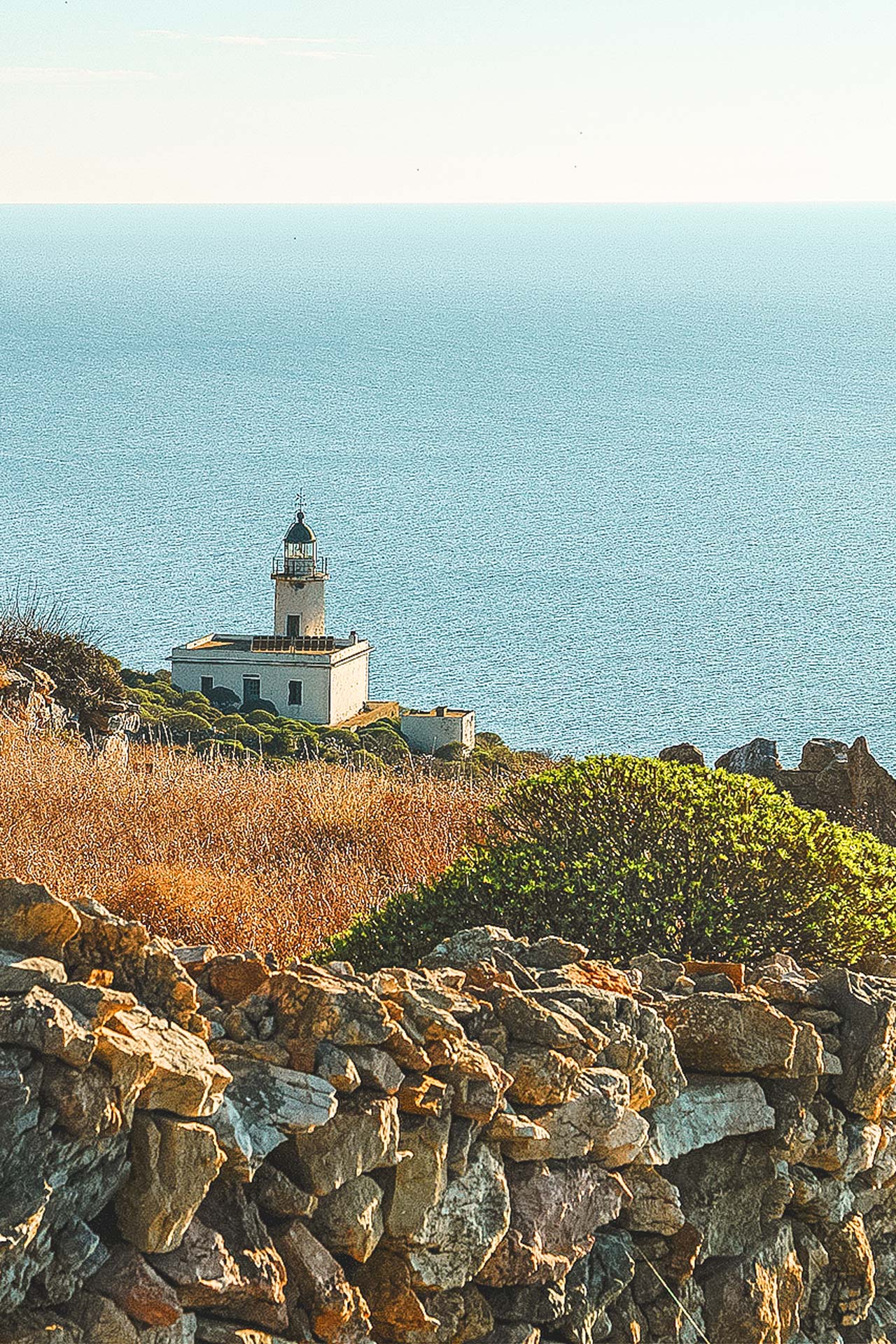 Take your time to enjoy the expansive Aegean view at Aspropounta Lighthouse-Folegandros