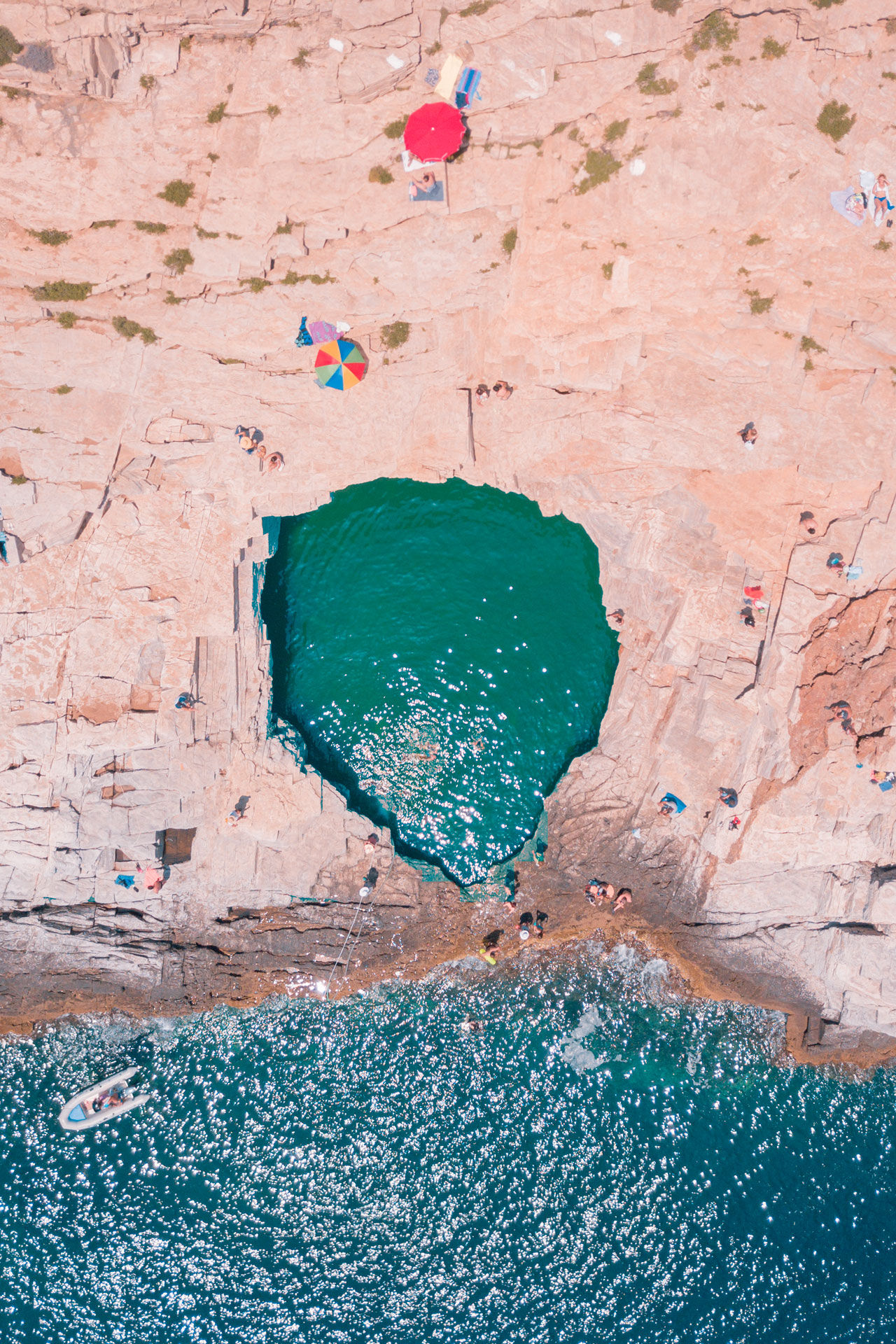 When visitors aren’t filling their Instagram feed with images of Giola, they laze on the rocks surrounding it