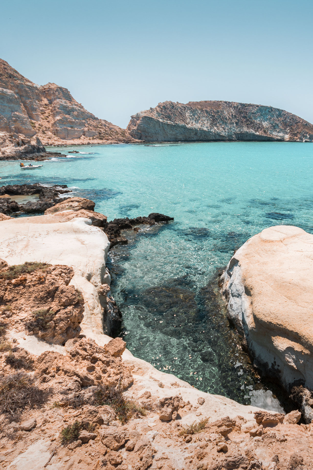 Amazing view of Koufonisi island with magical turquoise waters, lagoons, tropical beaches of pure white sand and ancient ruins on Crete, Greece