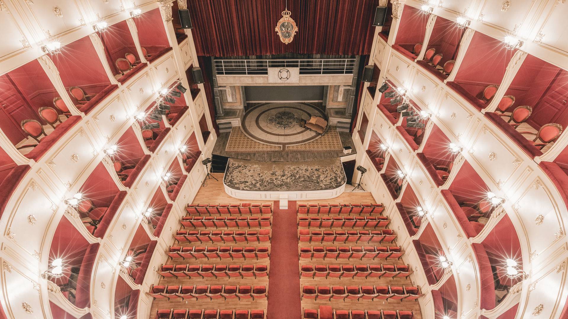The Apollo Theatre was modelled, in part, on the Scala di Milano, with four layers of boxes and an elaborate ceiling fresco adding a sense of opulence to the intimate main hall