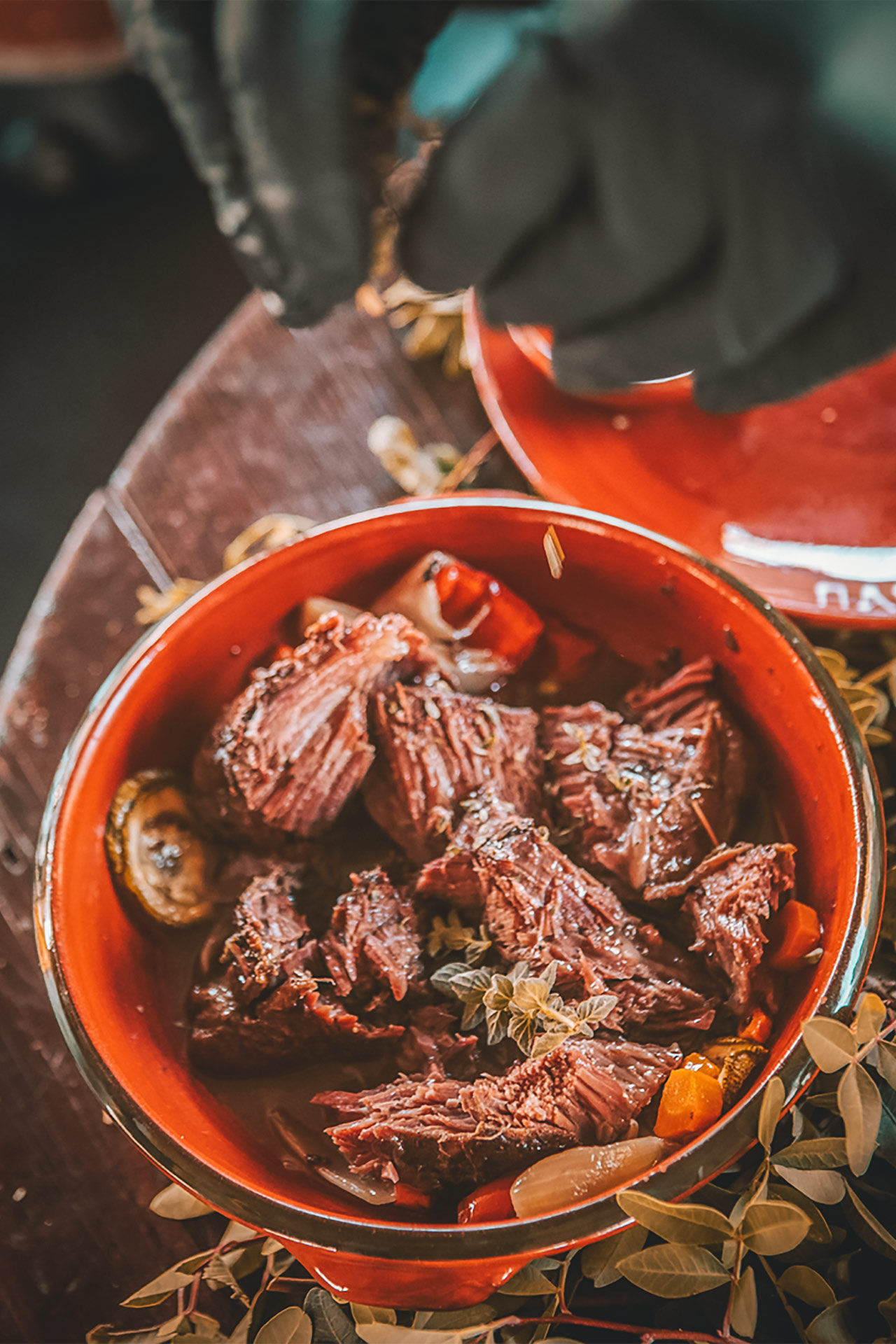 Taste robust meat dishes in a traditional tavern on Rhodes island.