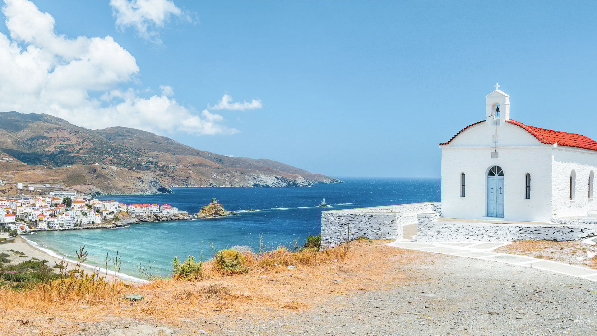 Panoramic view with small church on Andros island