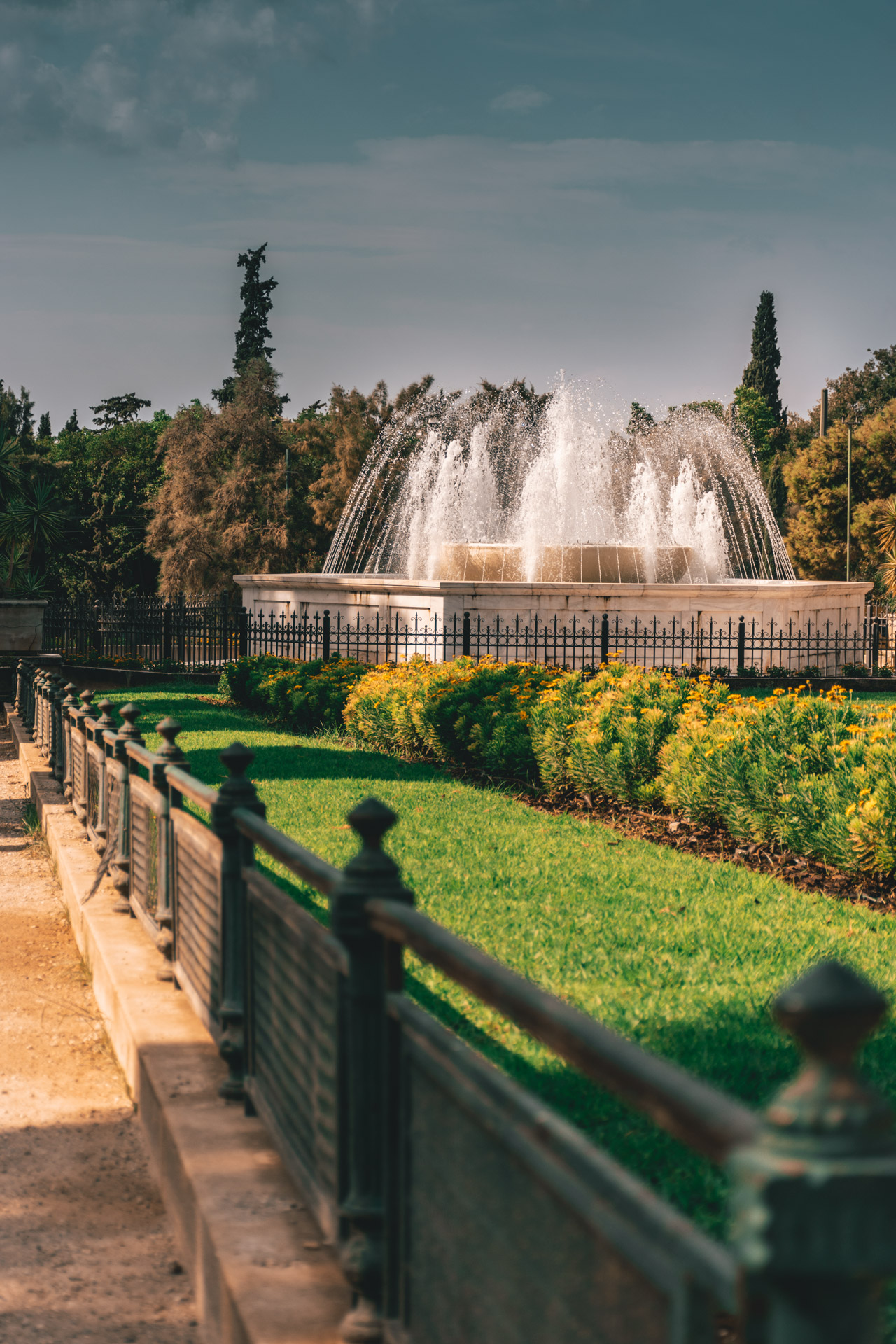 Stroll around the gardens around Zappeion Hall