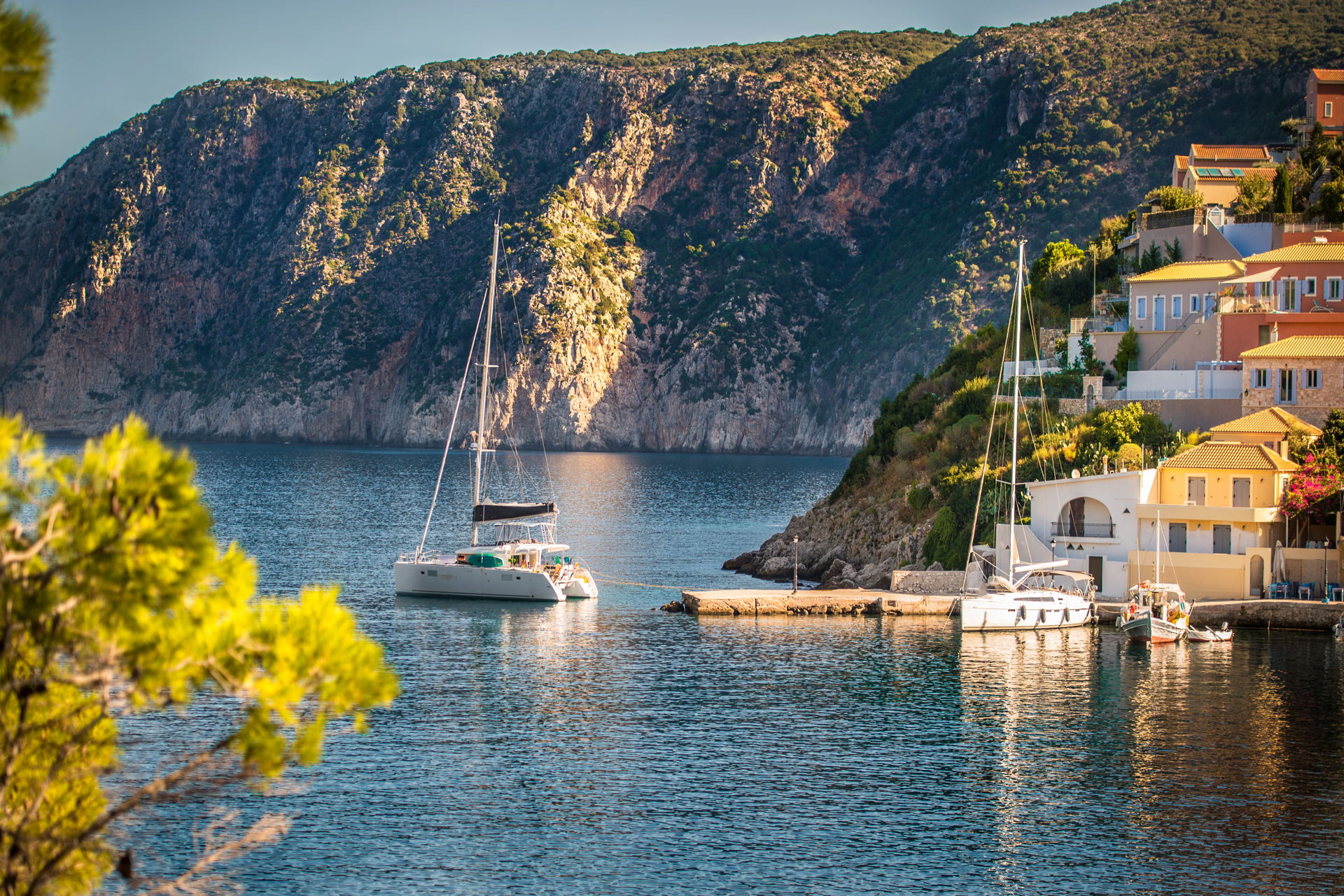 Beautiful landscape with bay and colorful buildings on the background in the town of Asos