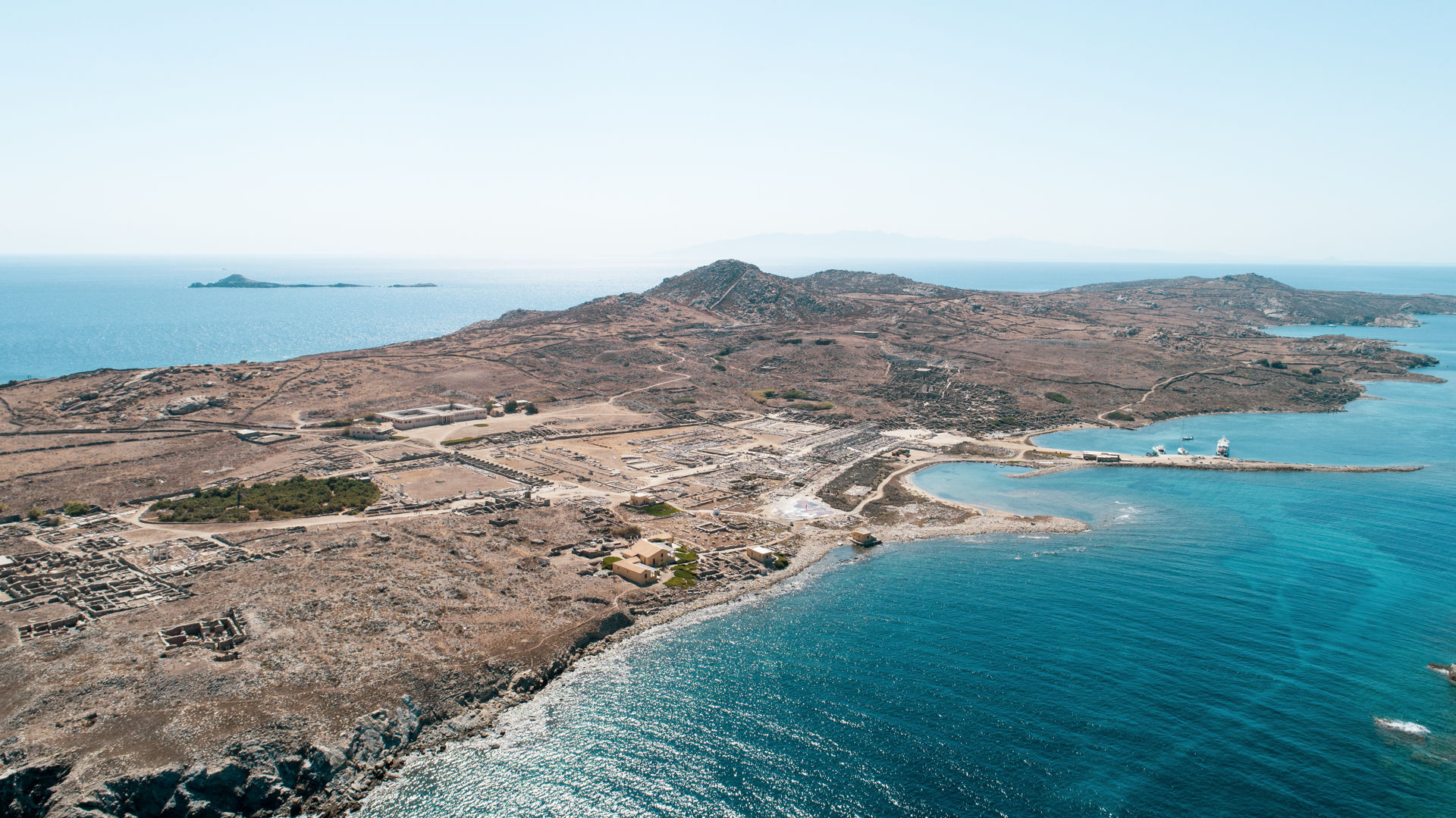 In Delos you can walk amongst the sanctuaries and statues of a vast Greco-Roman settlement