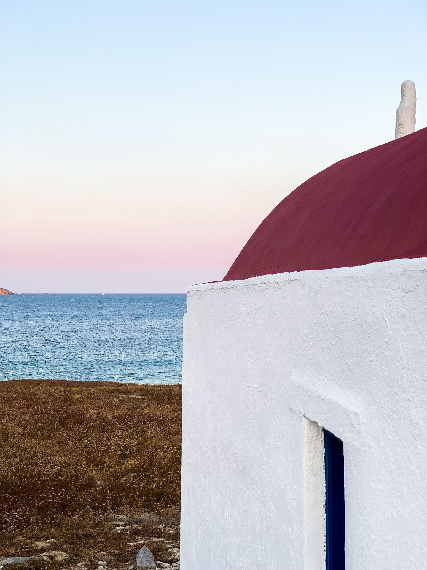 Little church in Delos with sea view
