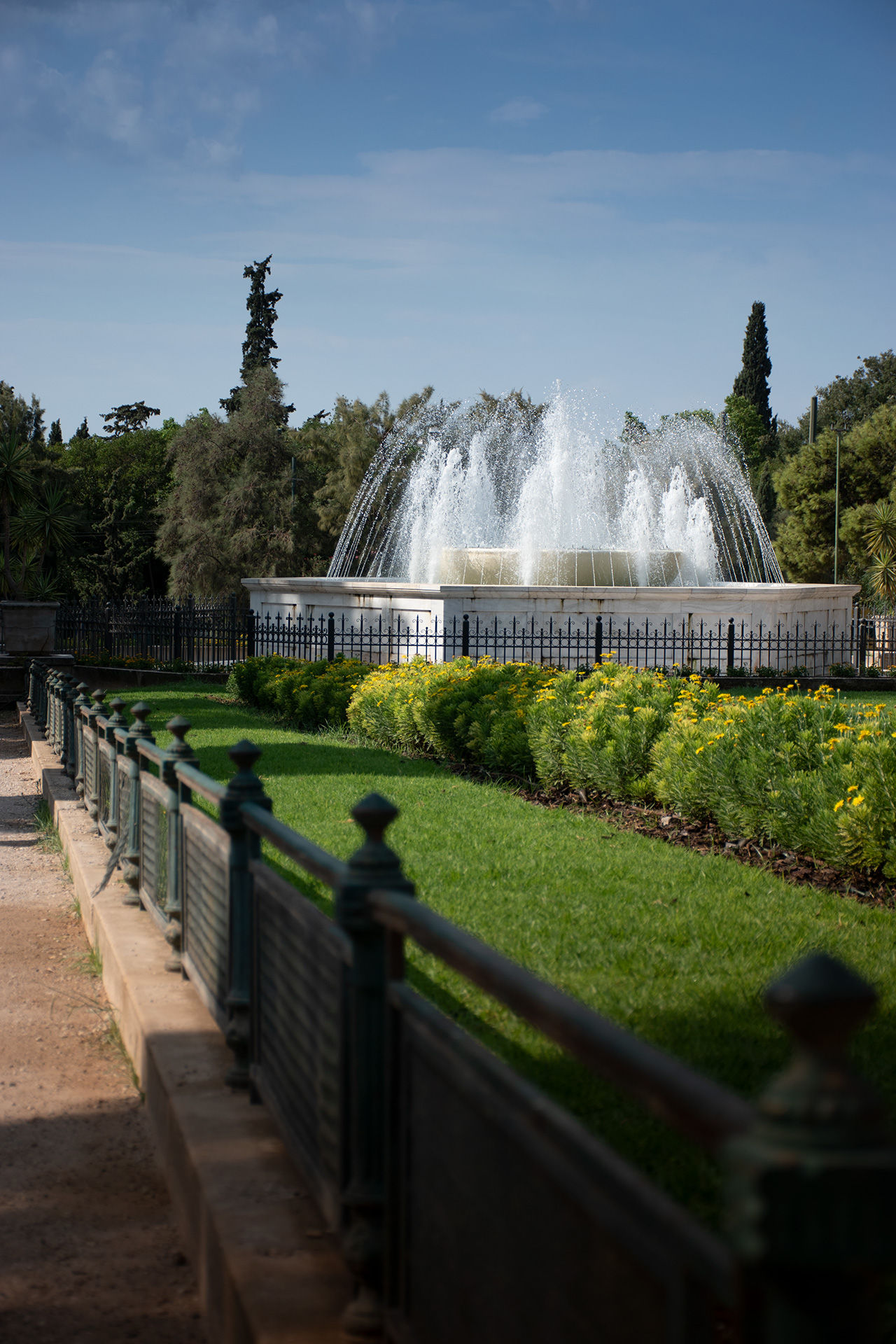 View of fountain and greenery in Zappeion park