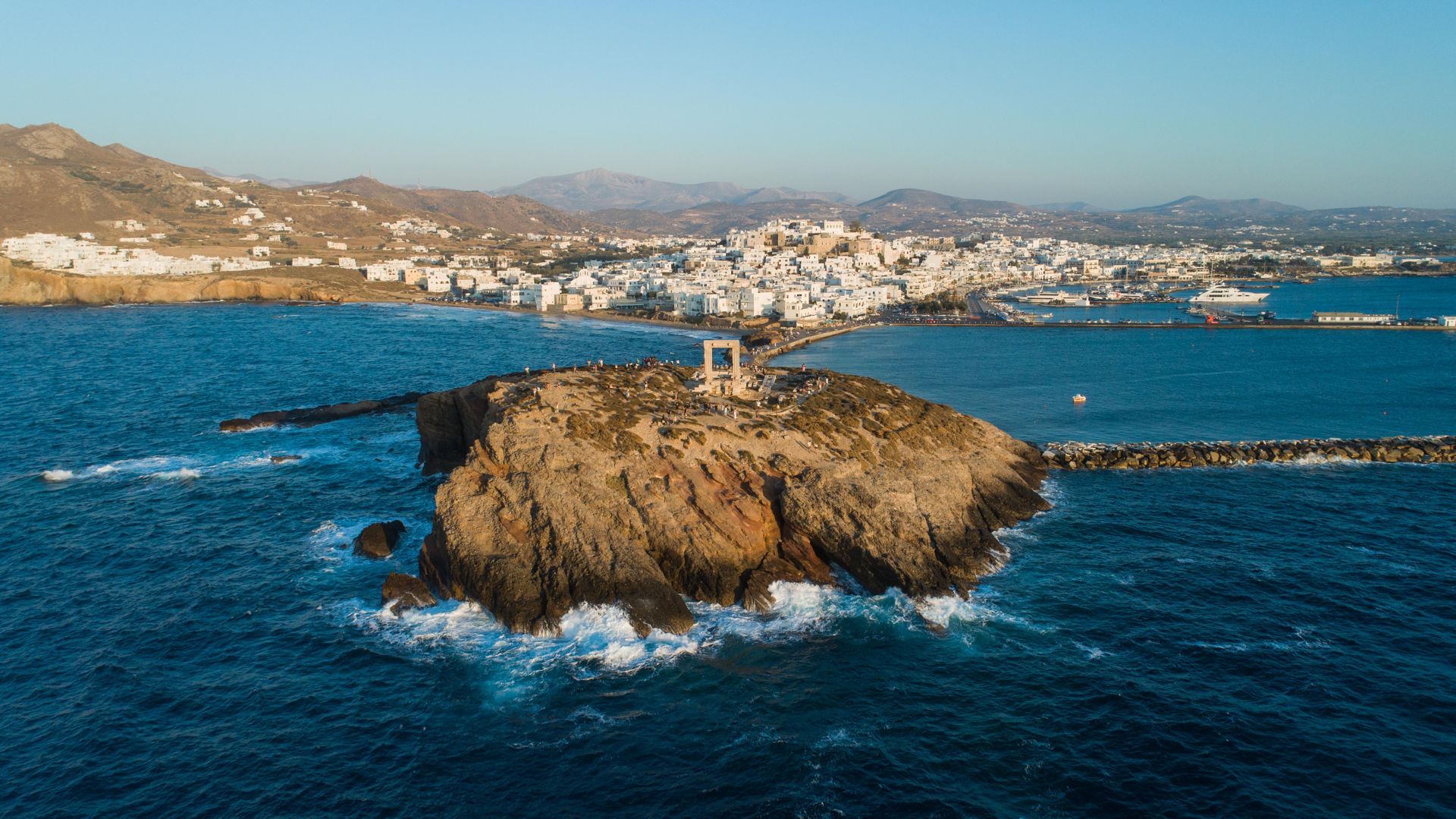 View of Naxos Hora from the little island on which Portara stands, Palatia, is now connected to the mainland