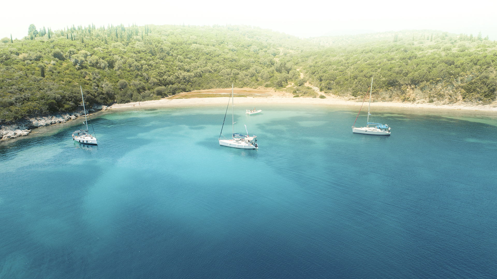 By hiring a sailing boat and skipper, you can set sail from Nydri and explore all those gorgeous beaches