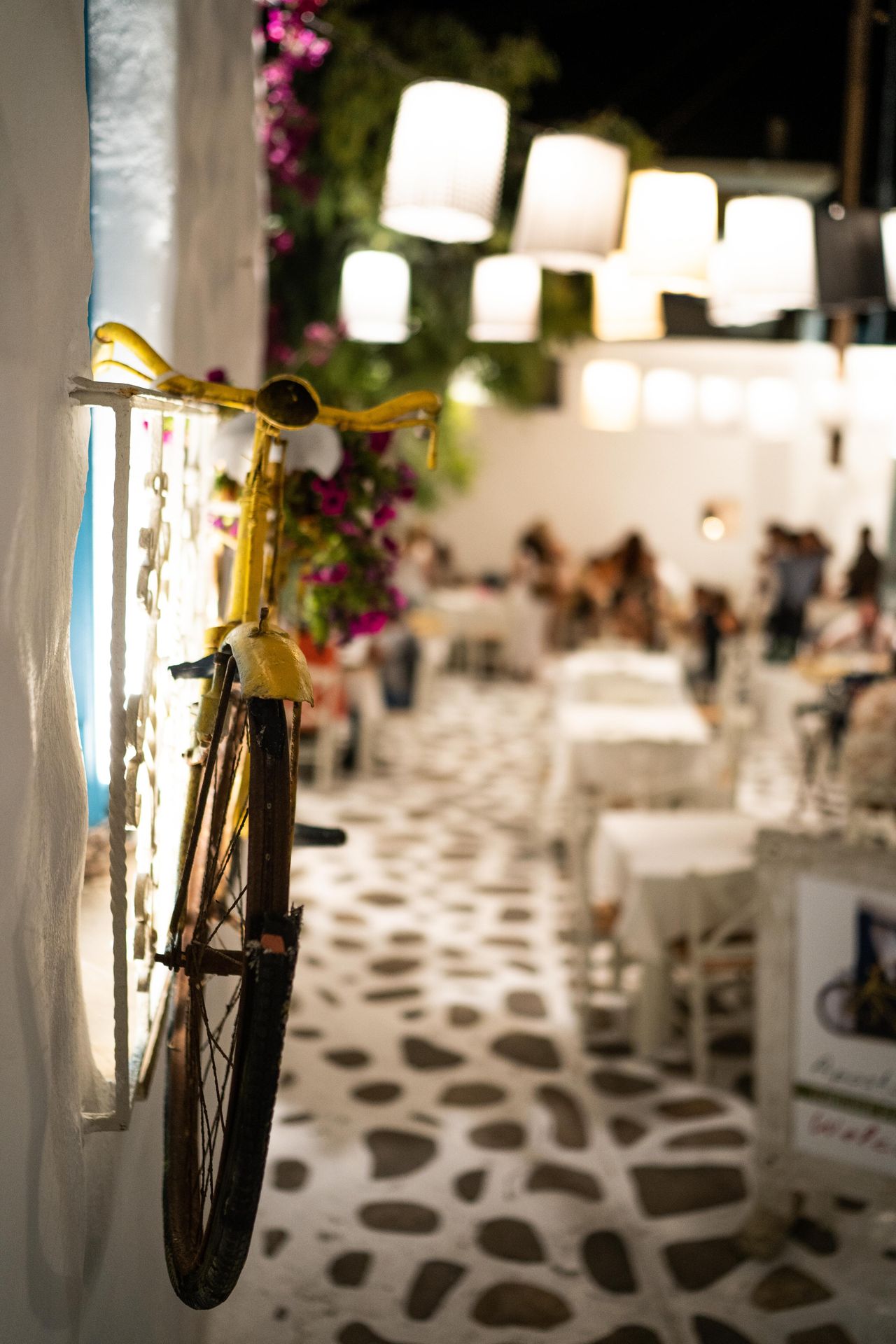 Enojy a night stroll around Hora of Naxos and pick your favourite restaurant-bar