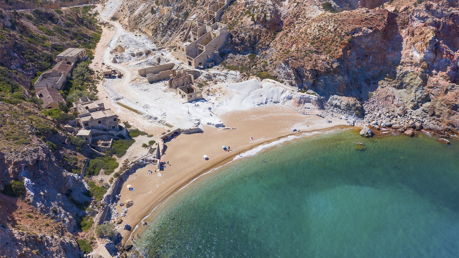 Paliorema, beach is often called Thiorichia after the mine, which you walk around before swimming in the beautifully clear water