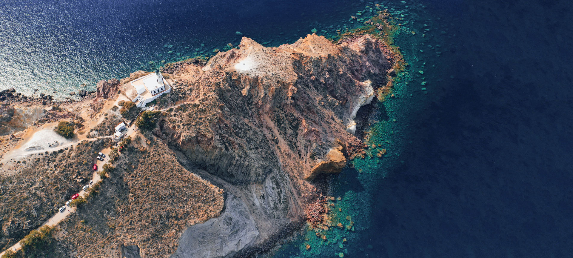 Aerial drone ultra wide photo of picturesque lighthouse built in Akrotiri