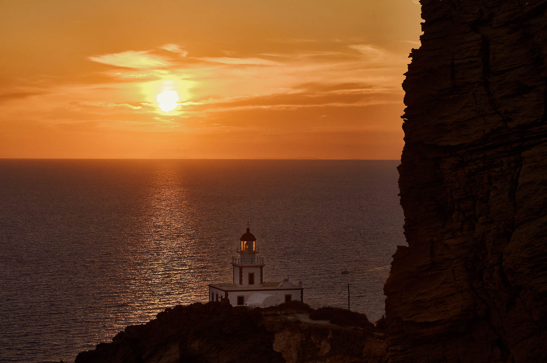 Sunset at Akrotiri lighthouse in Santorini