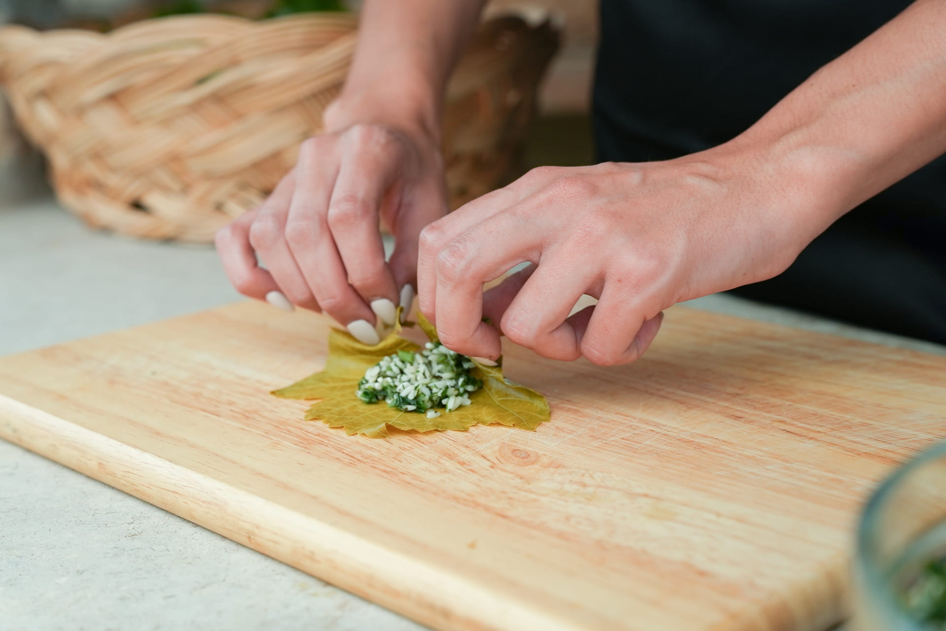 Learning how to make dolmades (stuffed vine leaves) in Halkidiki