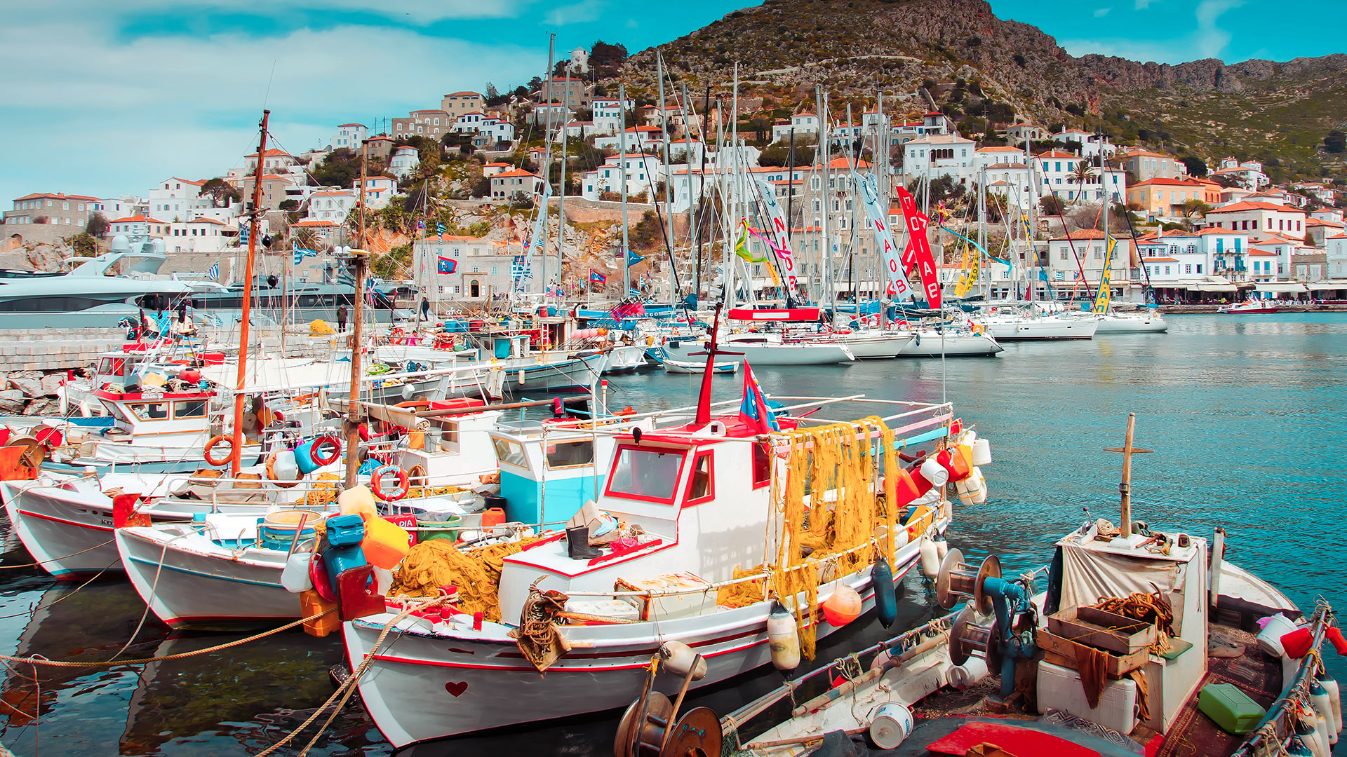 Kaikia and sailing boats in Hydra's harbour