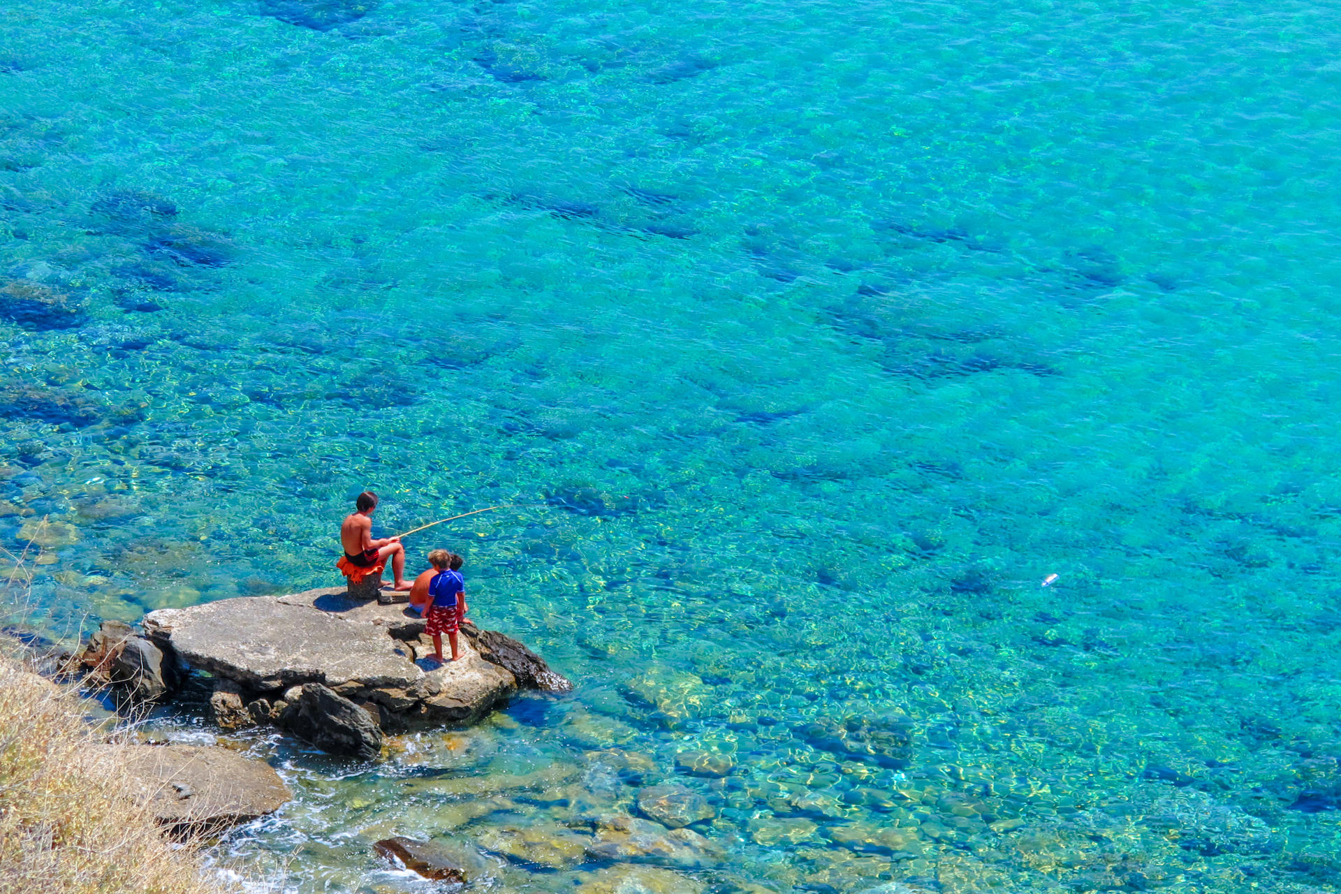 Boys fishing in Anafi 