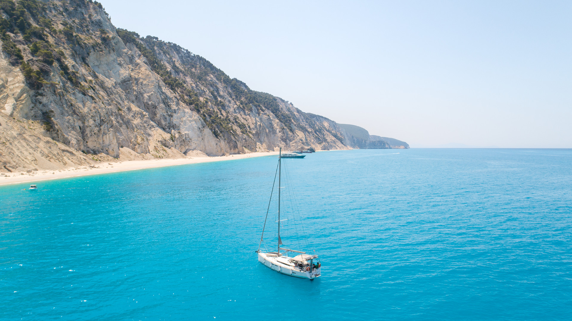 You walk down 400 steps to get to Egremni beach in Lefkada … unless you arrive by boat