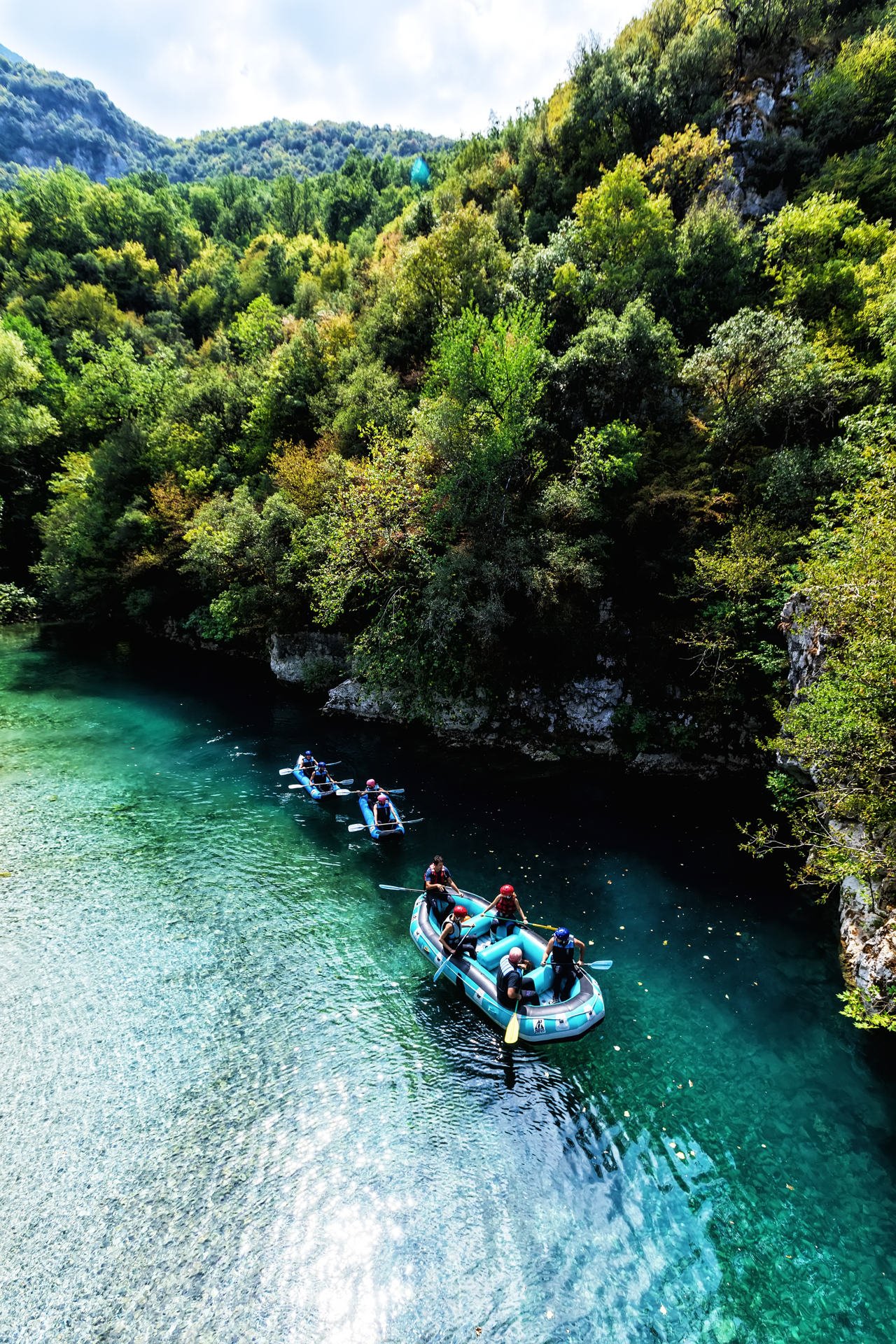 Adventure teams doing rafting on the cold waters of the Voidomatis River in Zagori. Voidomatis river is one of the most popular among rafters in Greece