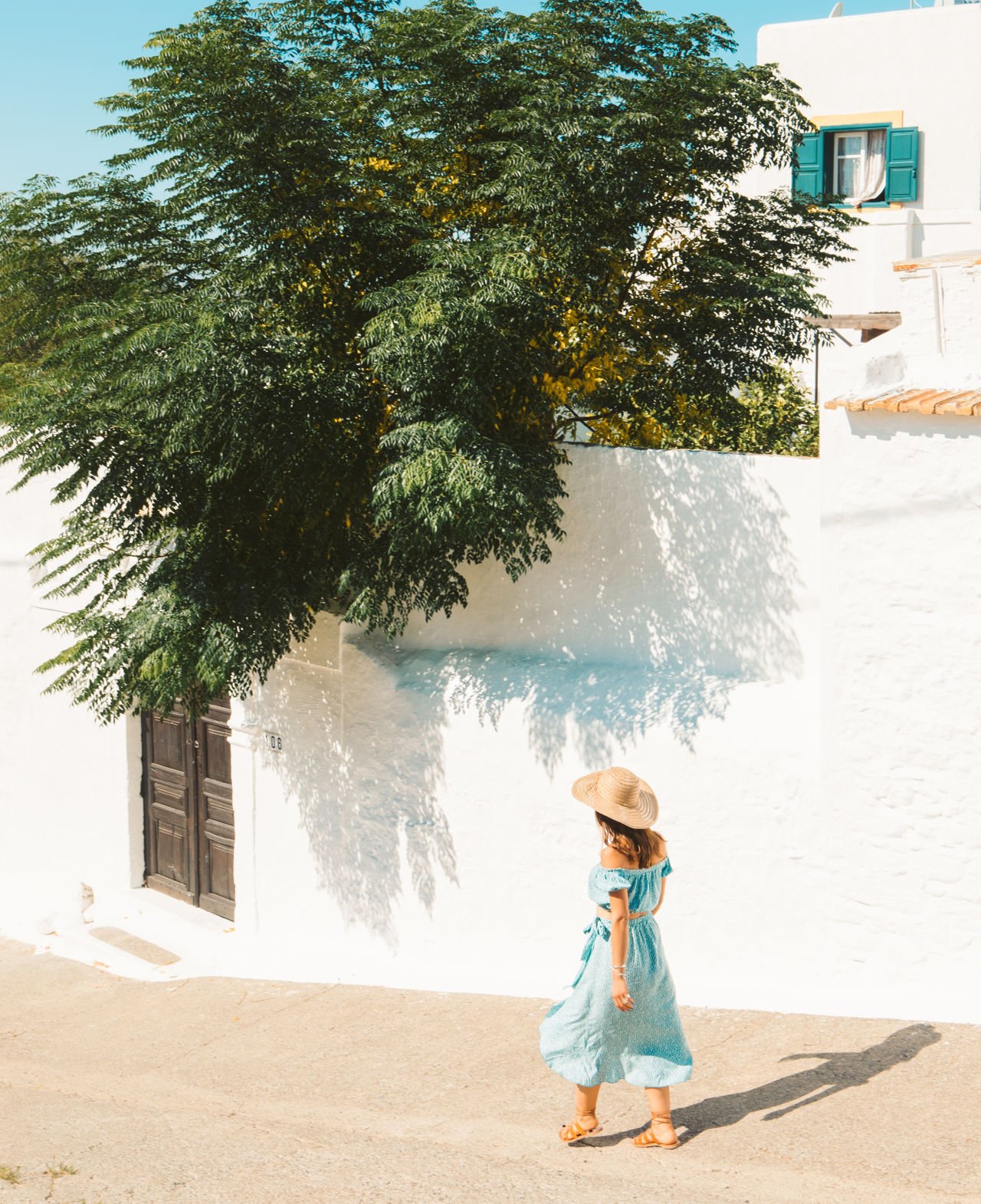 Lachania village (with its light blue doors and windows, carved stone gates and tile-roofs)