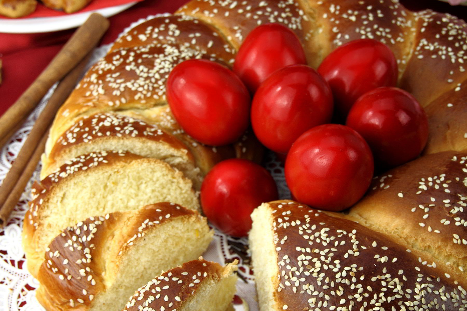 Red Easter eggs and traditional tsoureki 