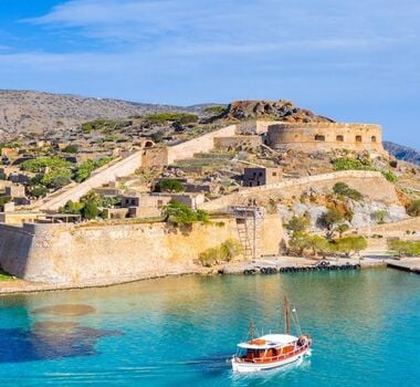 sail-into-history-private-boat-trip-to-spinalonga-with-a-traditional-caique-and-swimming-logo