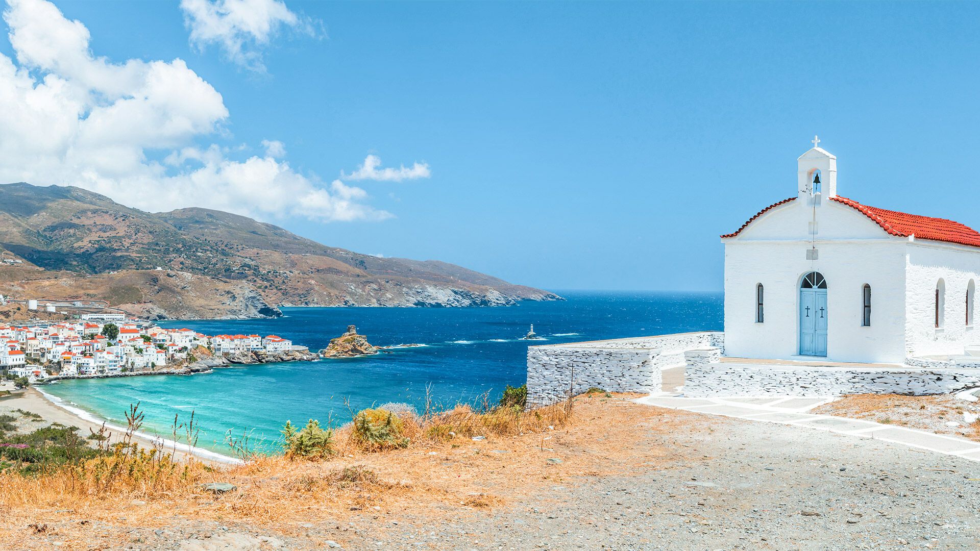 Panoramic view with small church, Andros island