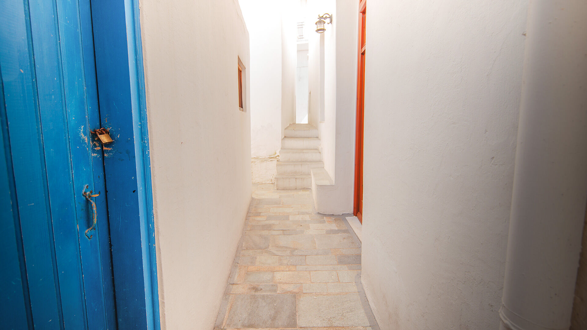 Walk around its narrow alleys where the whitewashed houses seamlessly merge with each other