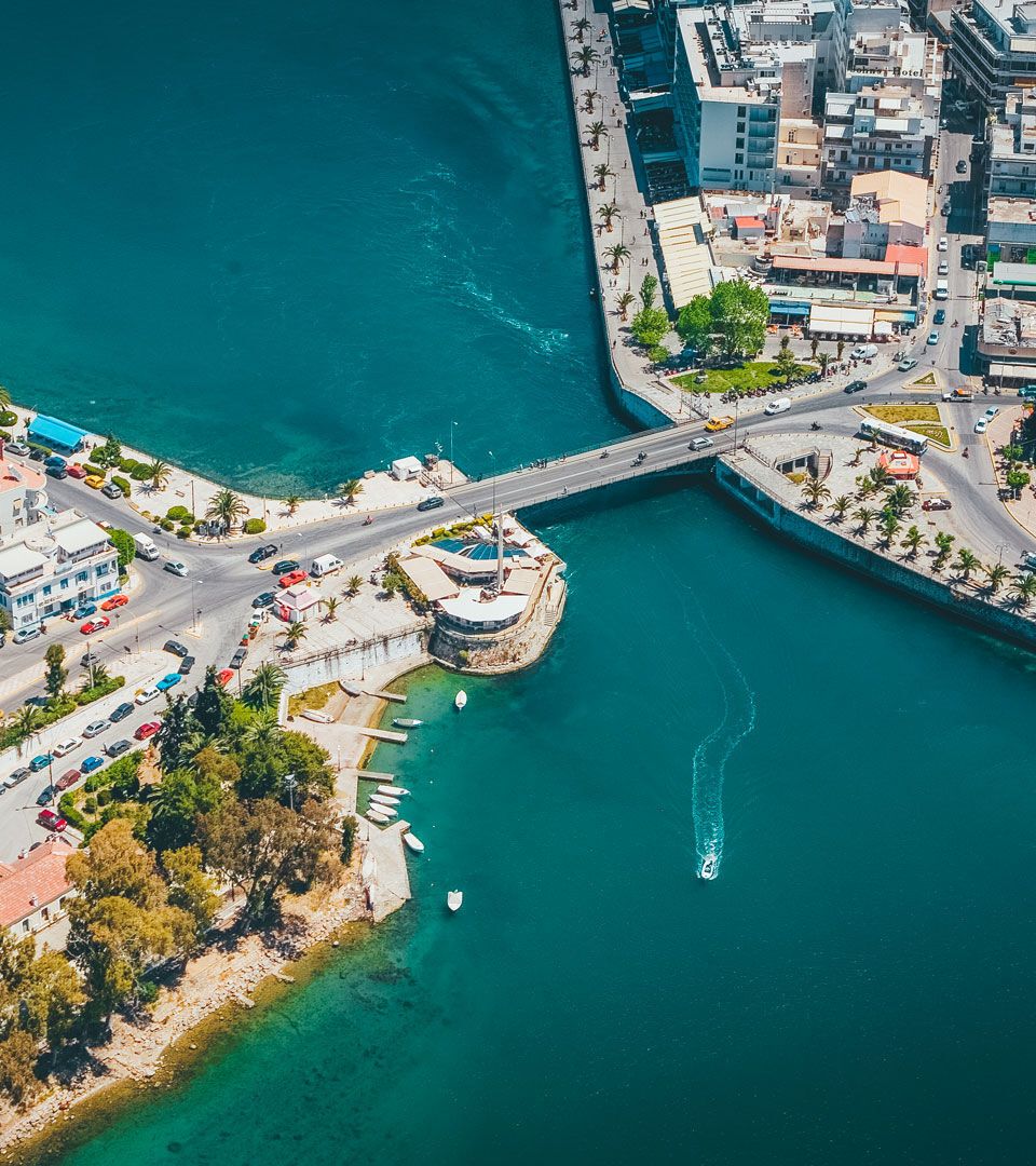 Below the old bridge linking Chalkida with the mainland you’ll witness  something that happens nowhere else in the world